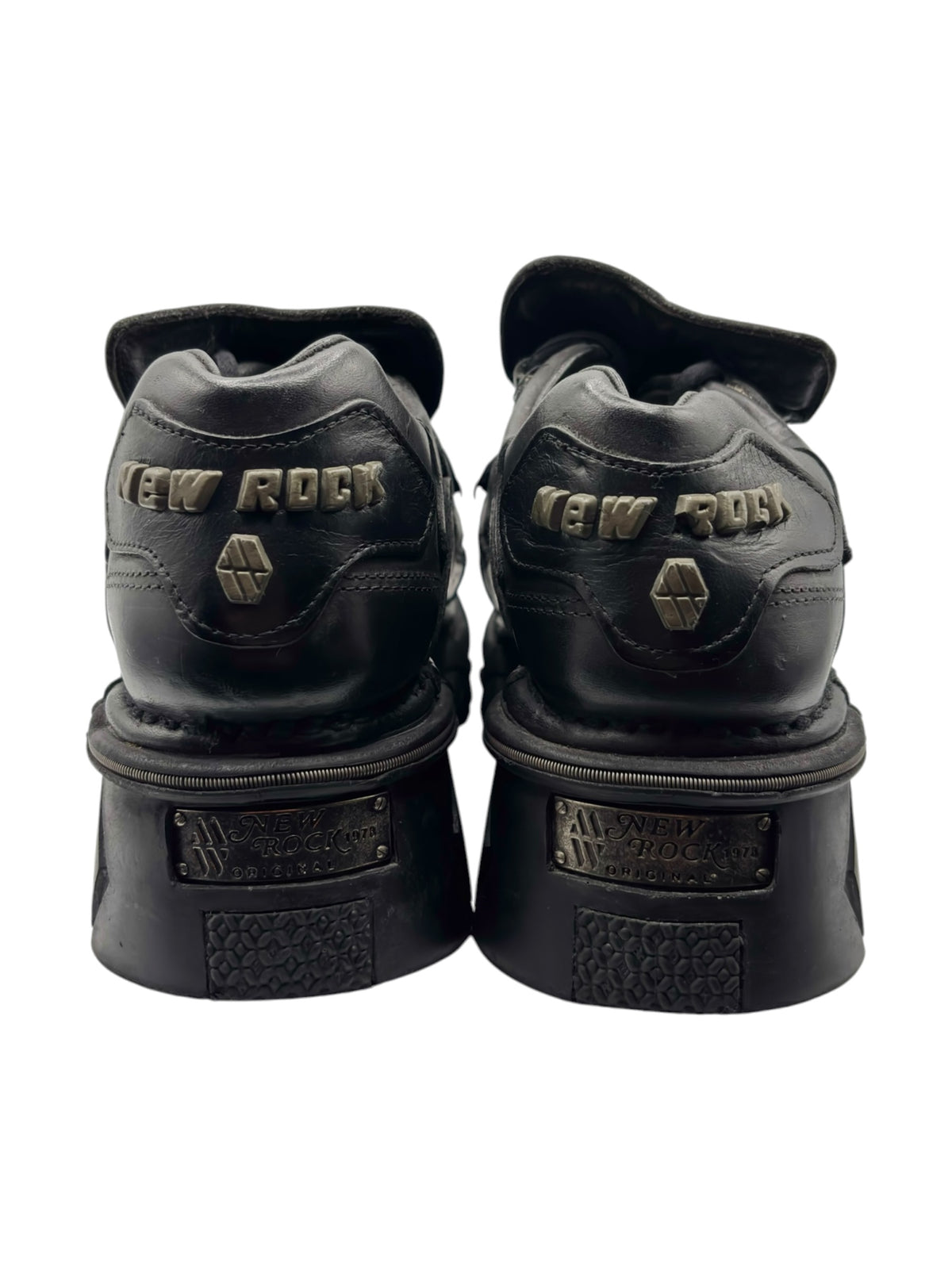 New Rock vintage leather platform boots with heel branding on the back of the pair