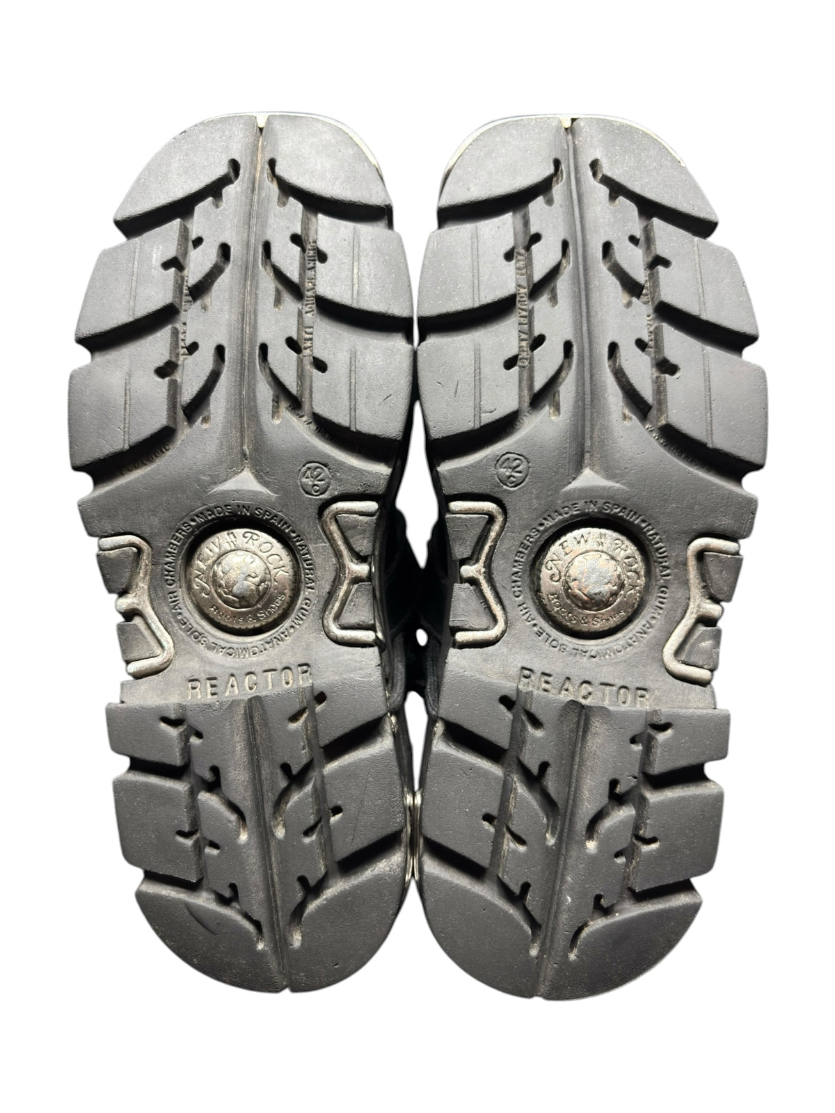 Pair of mid-calf reactor boots showing patterned rubber outsoles