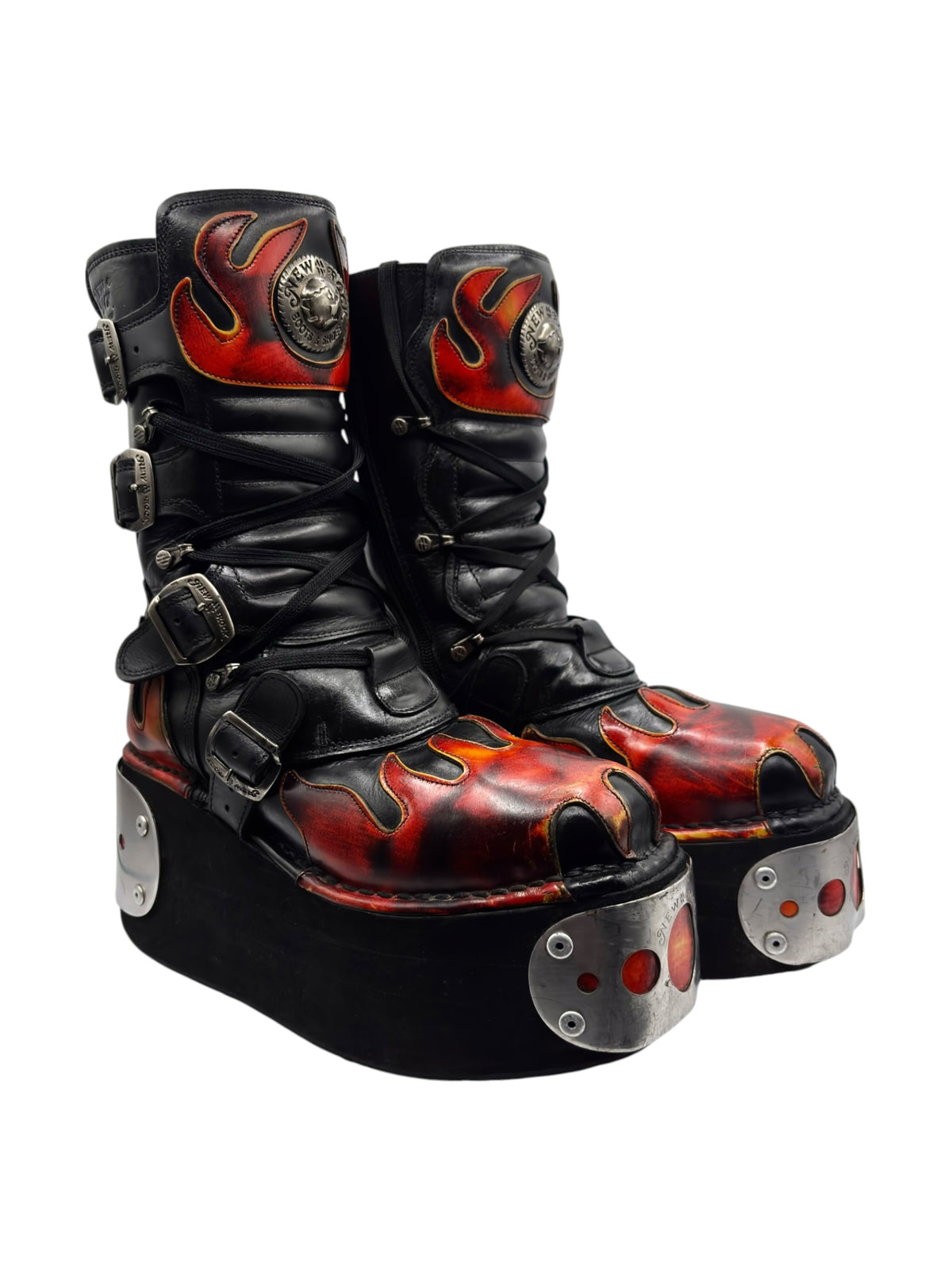 Black flame platform boots, side view, lace-up with buckles and round silver studs
