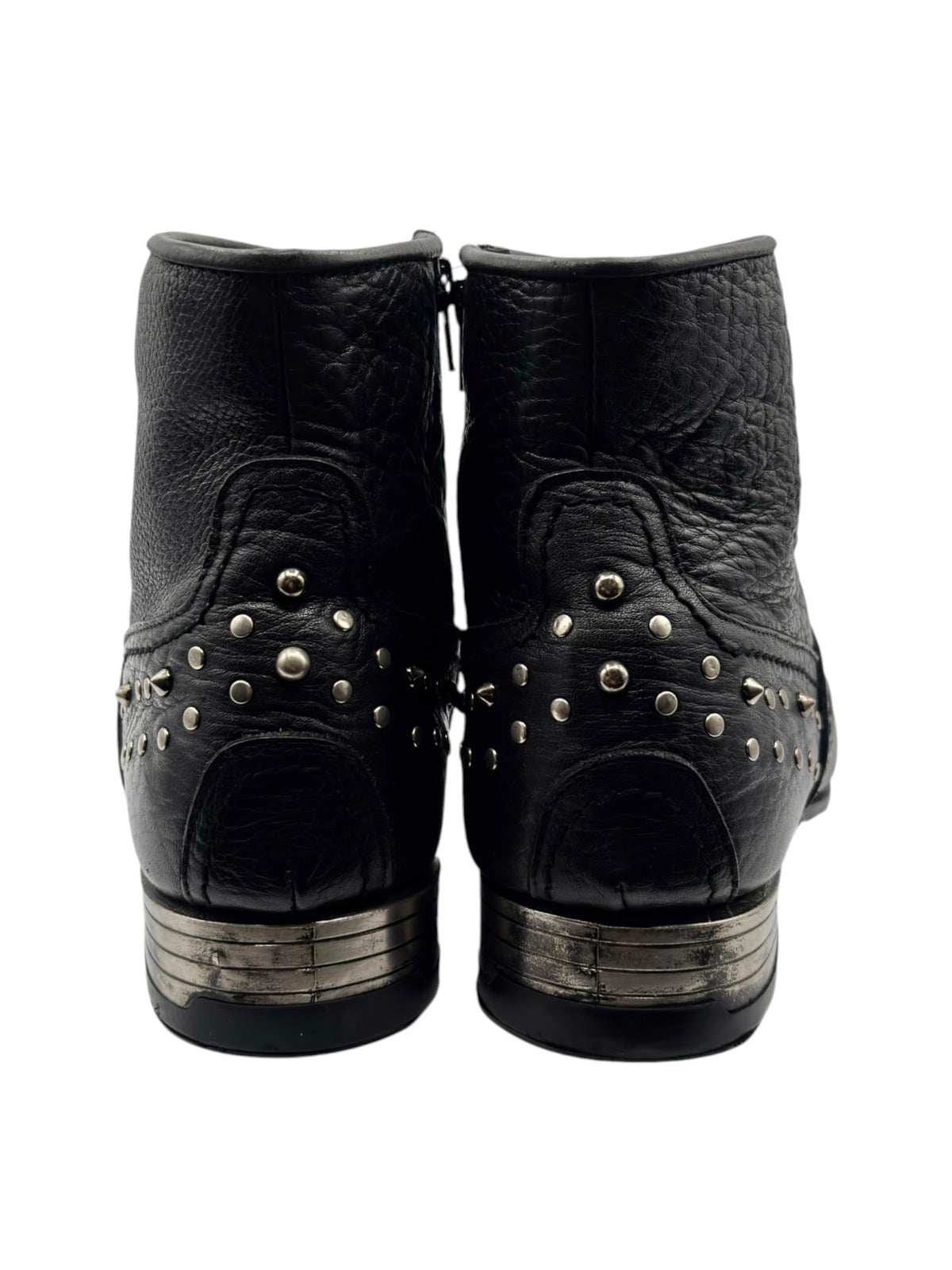 Black leather cowboy boots with gold-tone studs, back view showing stacked heel.