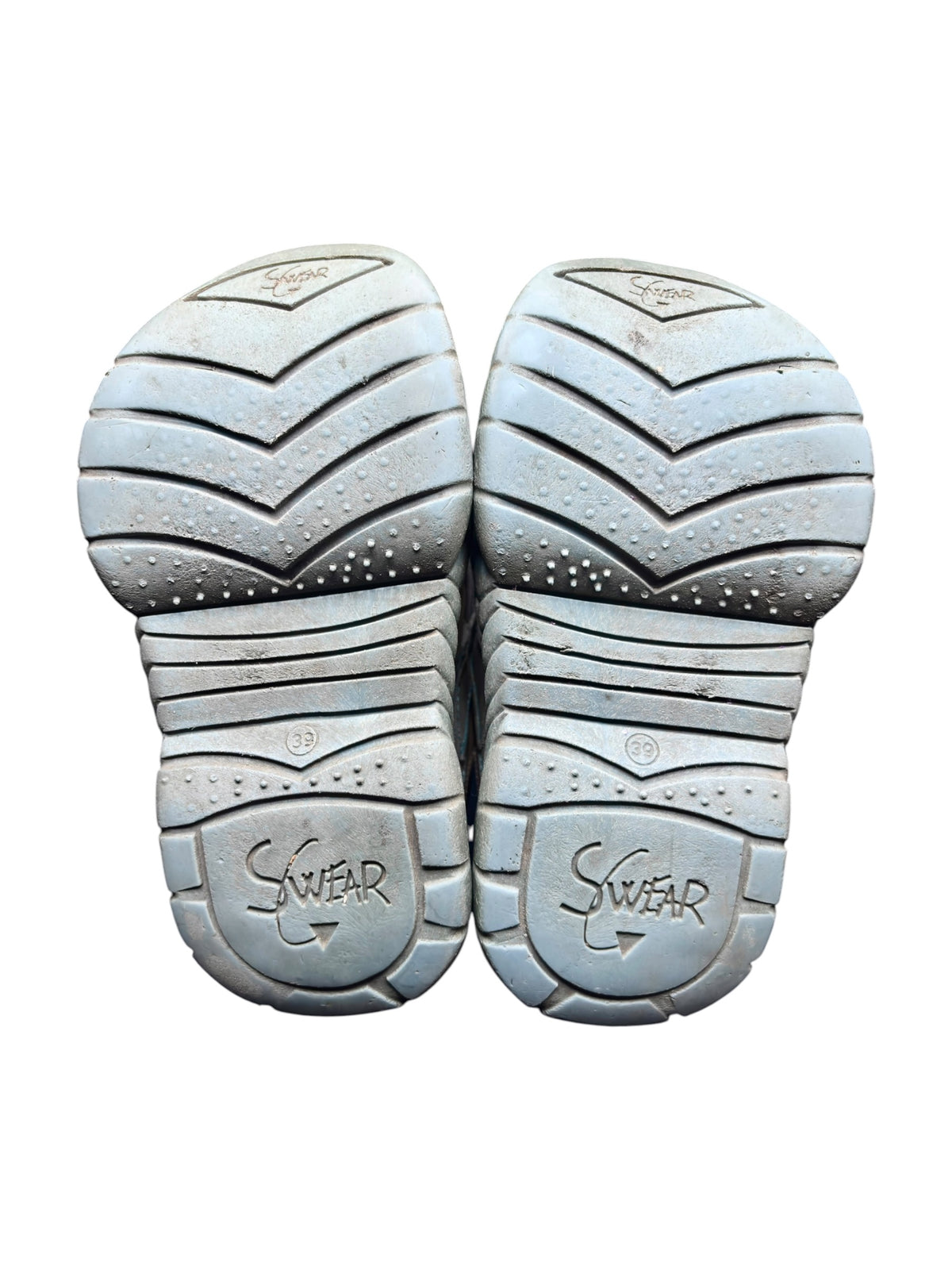 Pair of Swear platform boots outsoles with zigzag tread and logos
