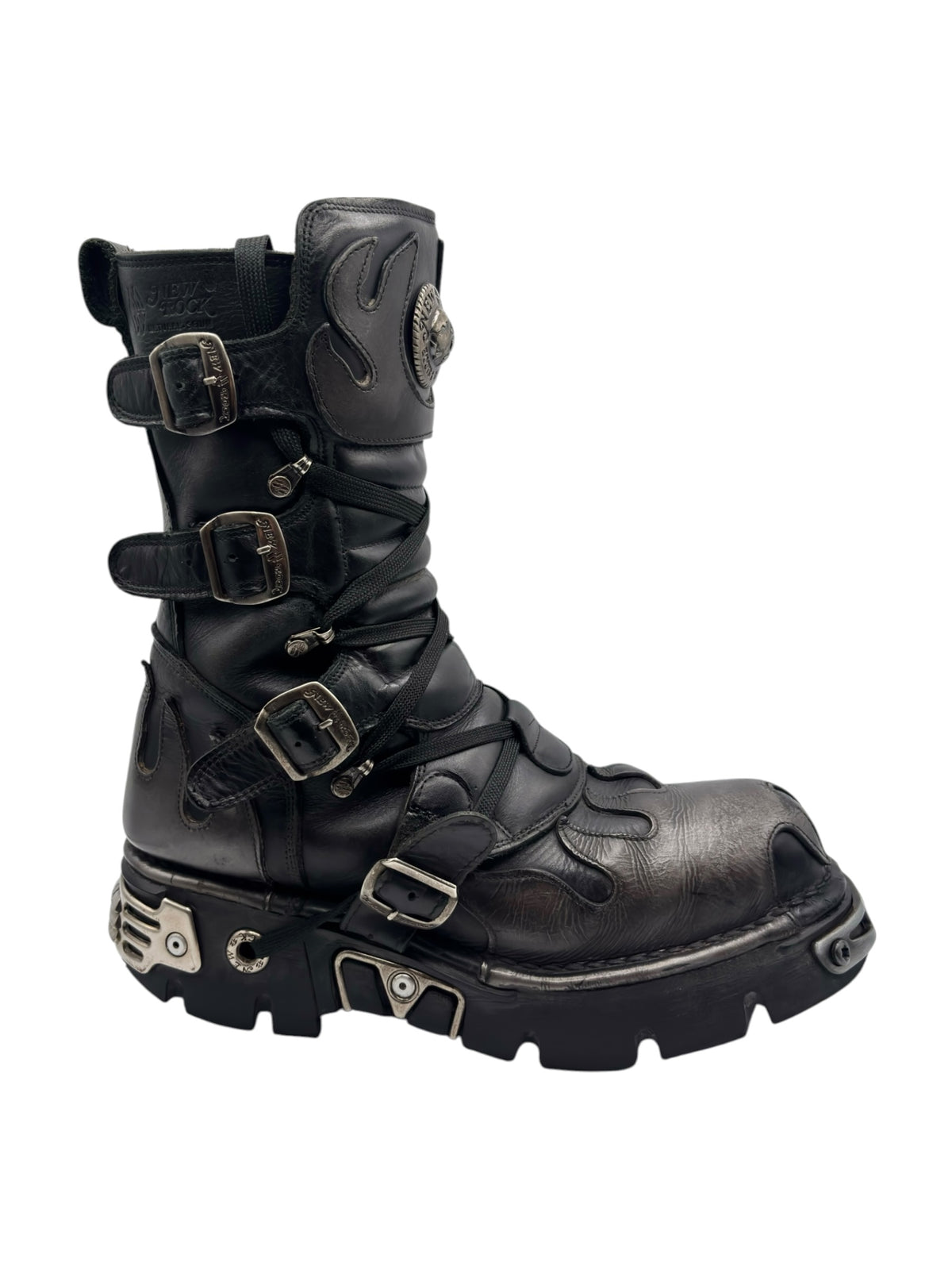 Black New Rock Reactor flame boots with layered straps, buckles, and chunky outsole.