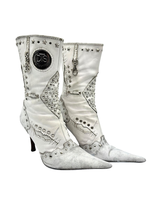 Vintage white pointy leather boots with studded motifs, side zippers, and high heels