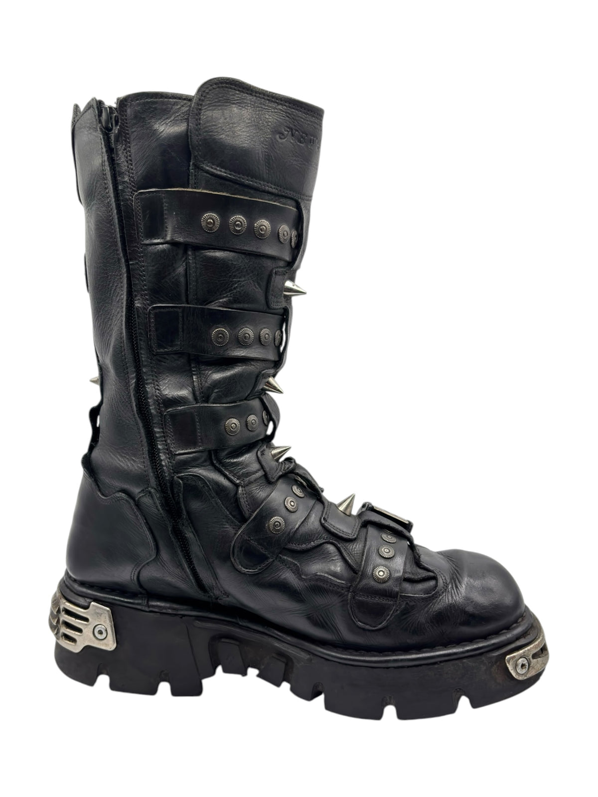 Black leather platform boots with cuff straps, metal eyelets, and ribbed tread sole