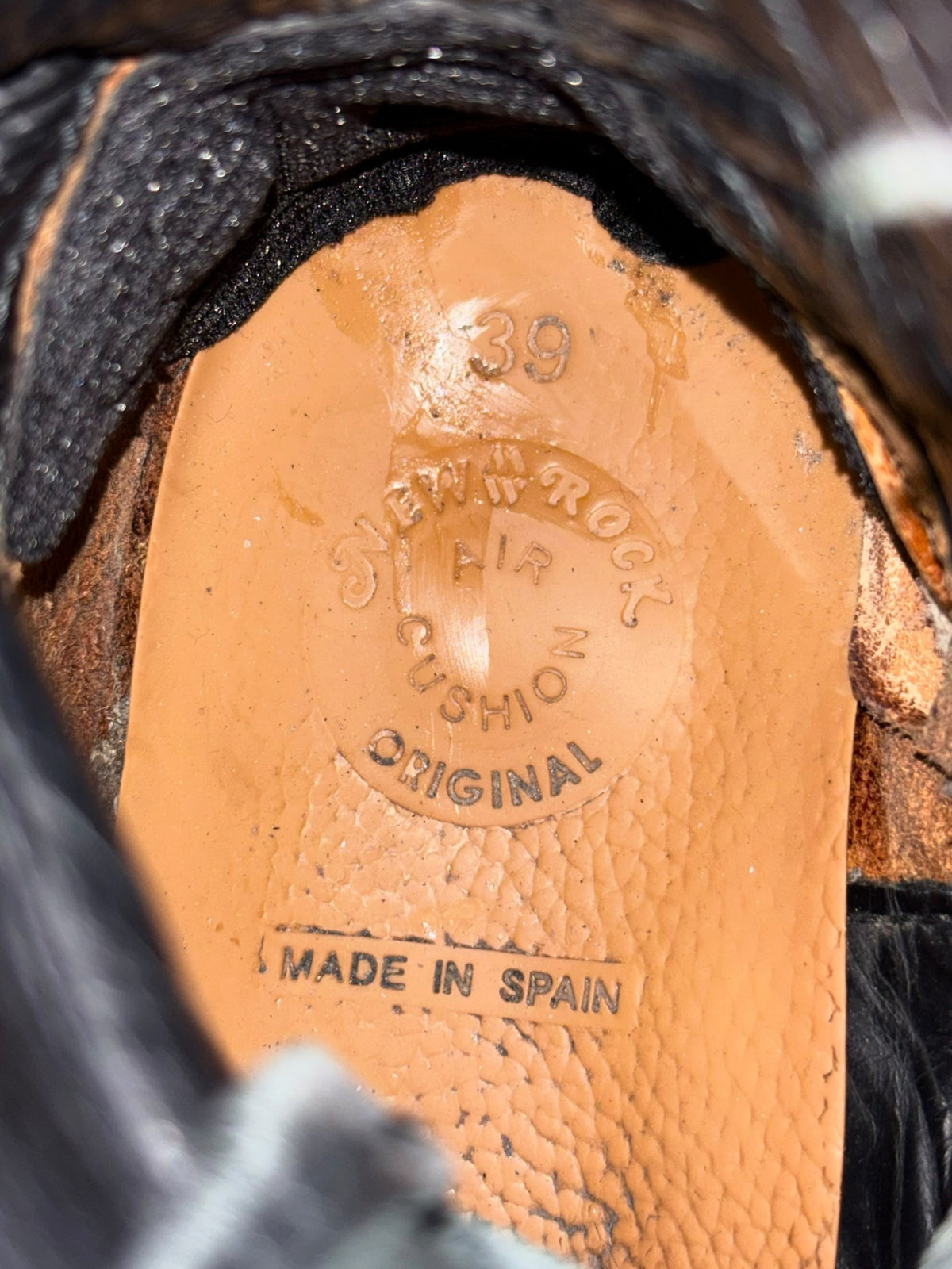 Black platform boot insole with size and “Made in Spain” stamp.