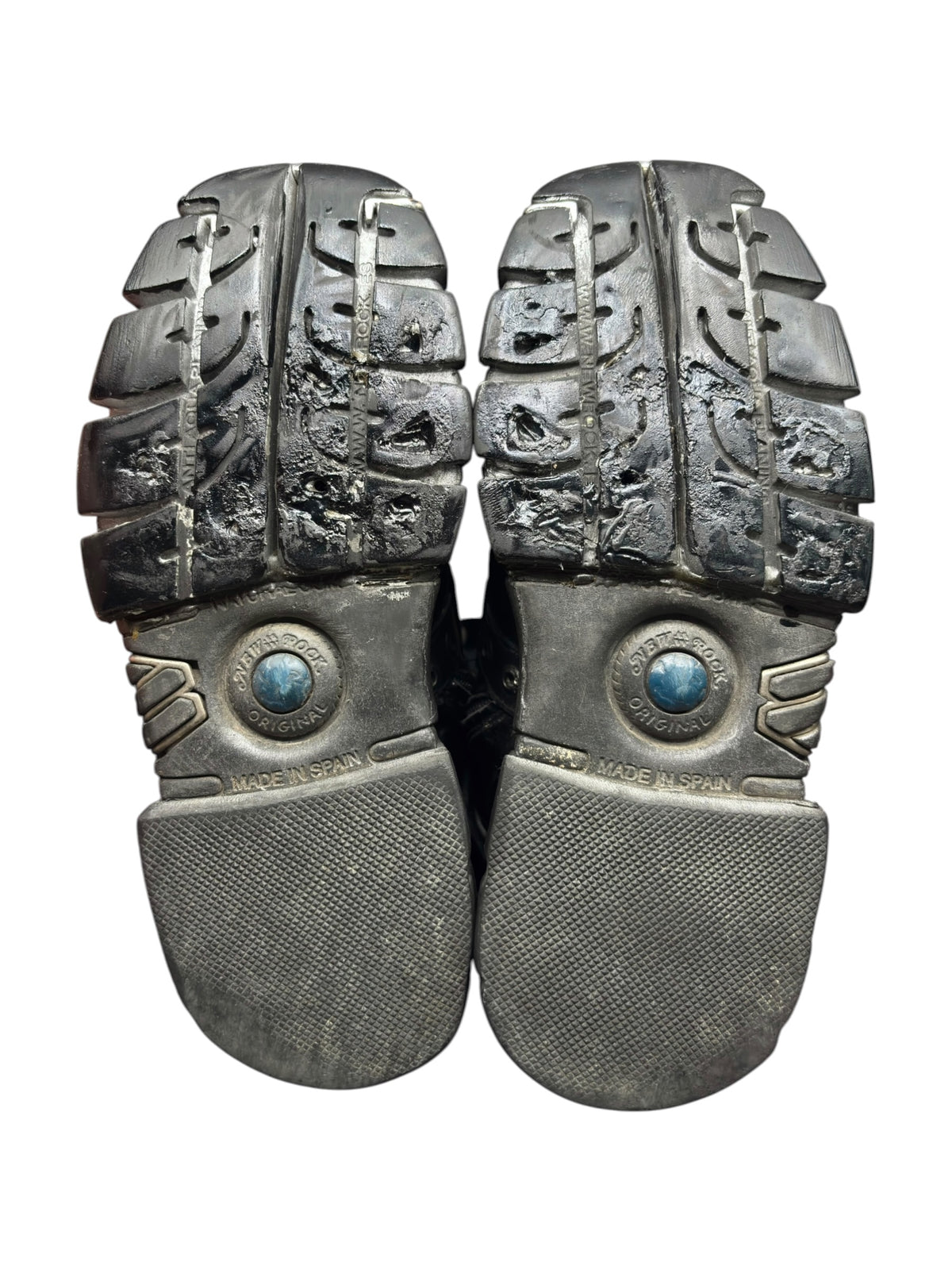 Pair of vintage platform boots, textured metal toe plates and grippy rubber soles