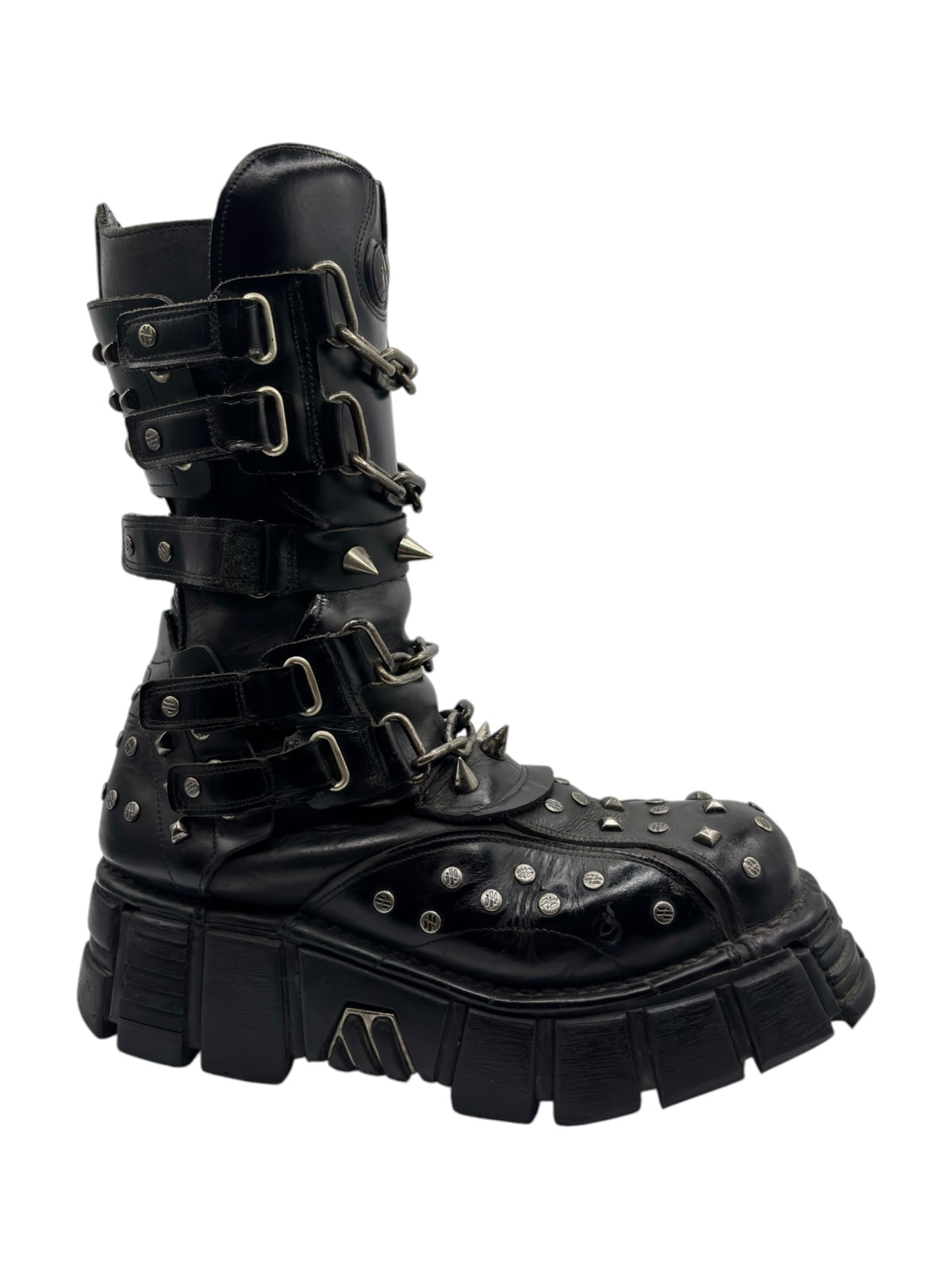 Studded chain platform boots in black, angled side view with chain straps and metal studs