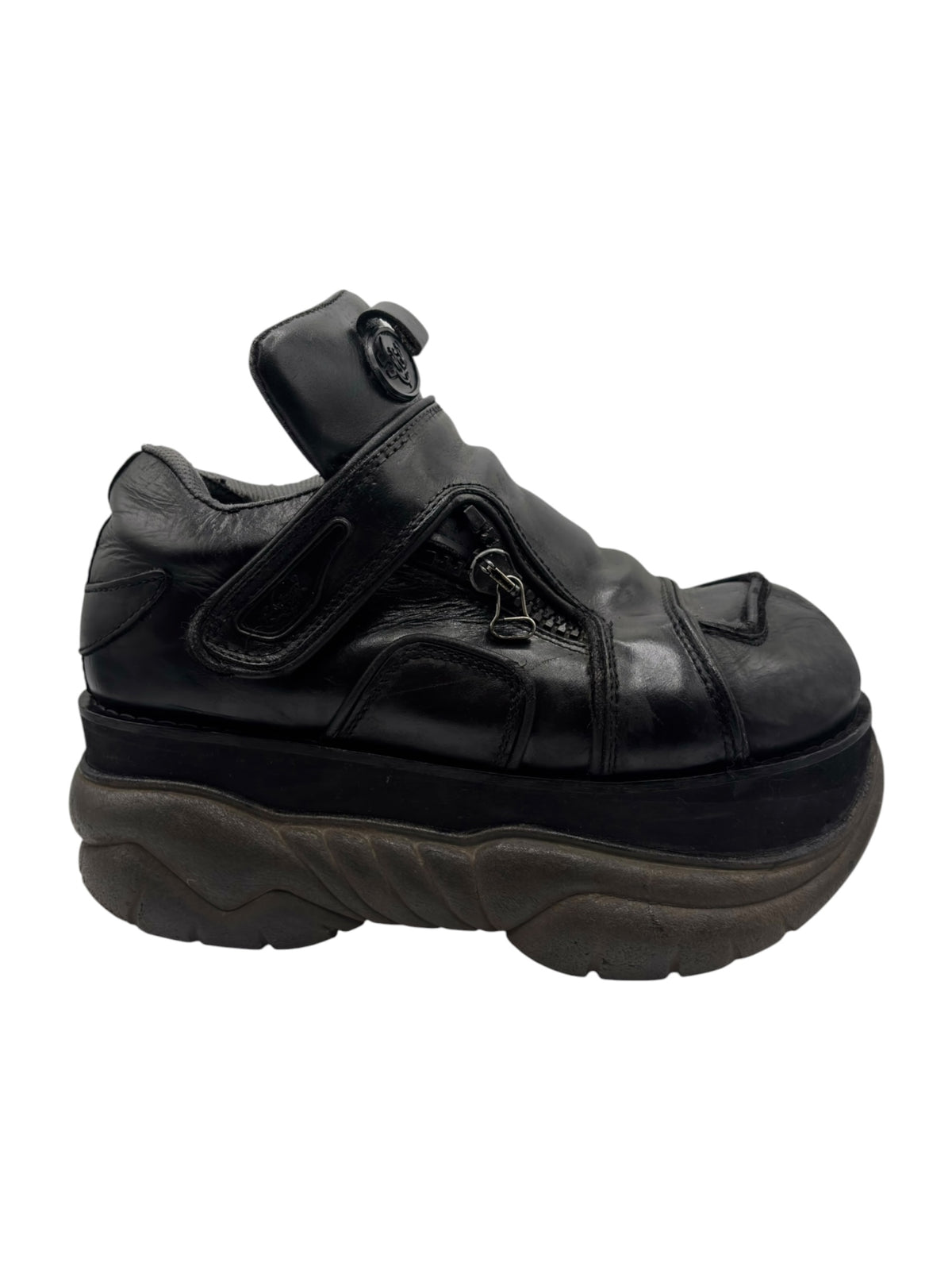 Vintage Swear London platform boots front three-quarter view, black leather and strap closure