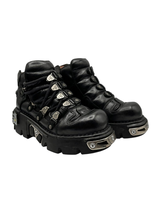 New Rock reactor platform boots, black leather side view with strap buckles