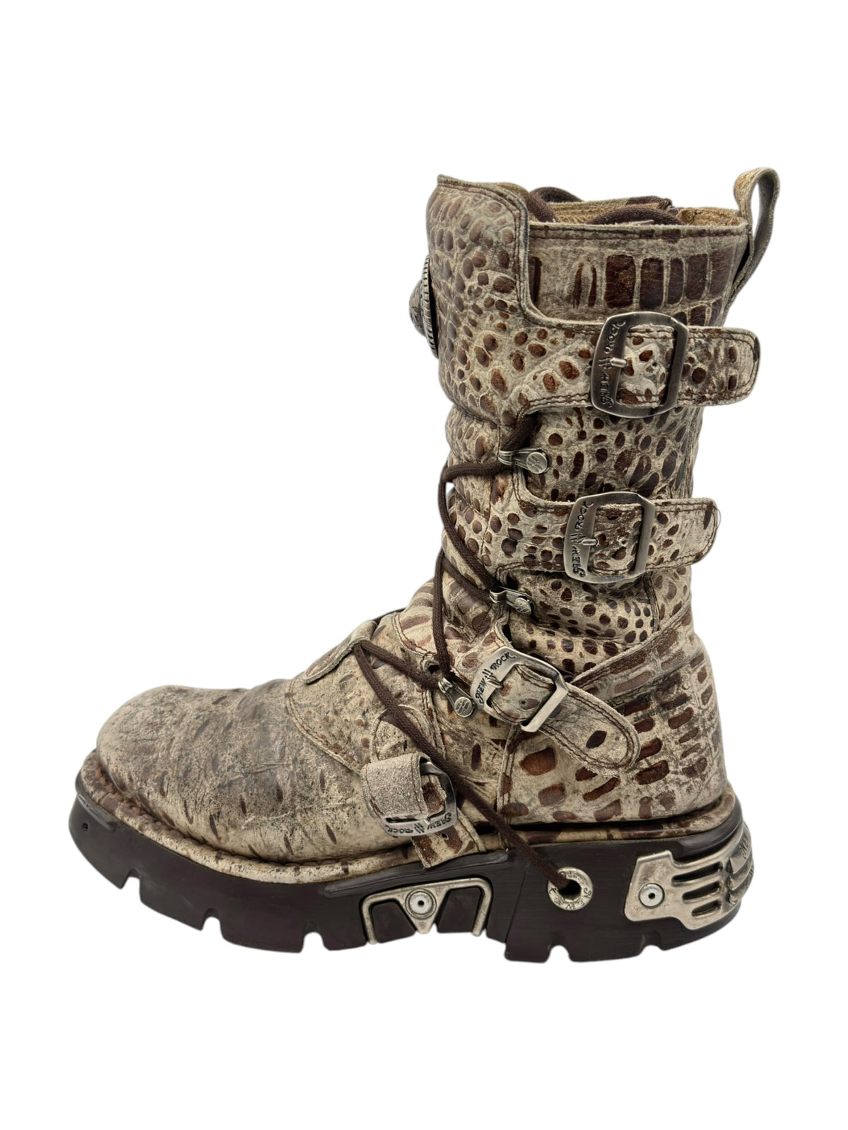 Mid-calf desert-camo leather boots with layered straps, buckles, and lace-up closure