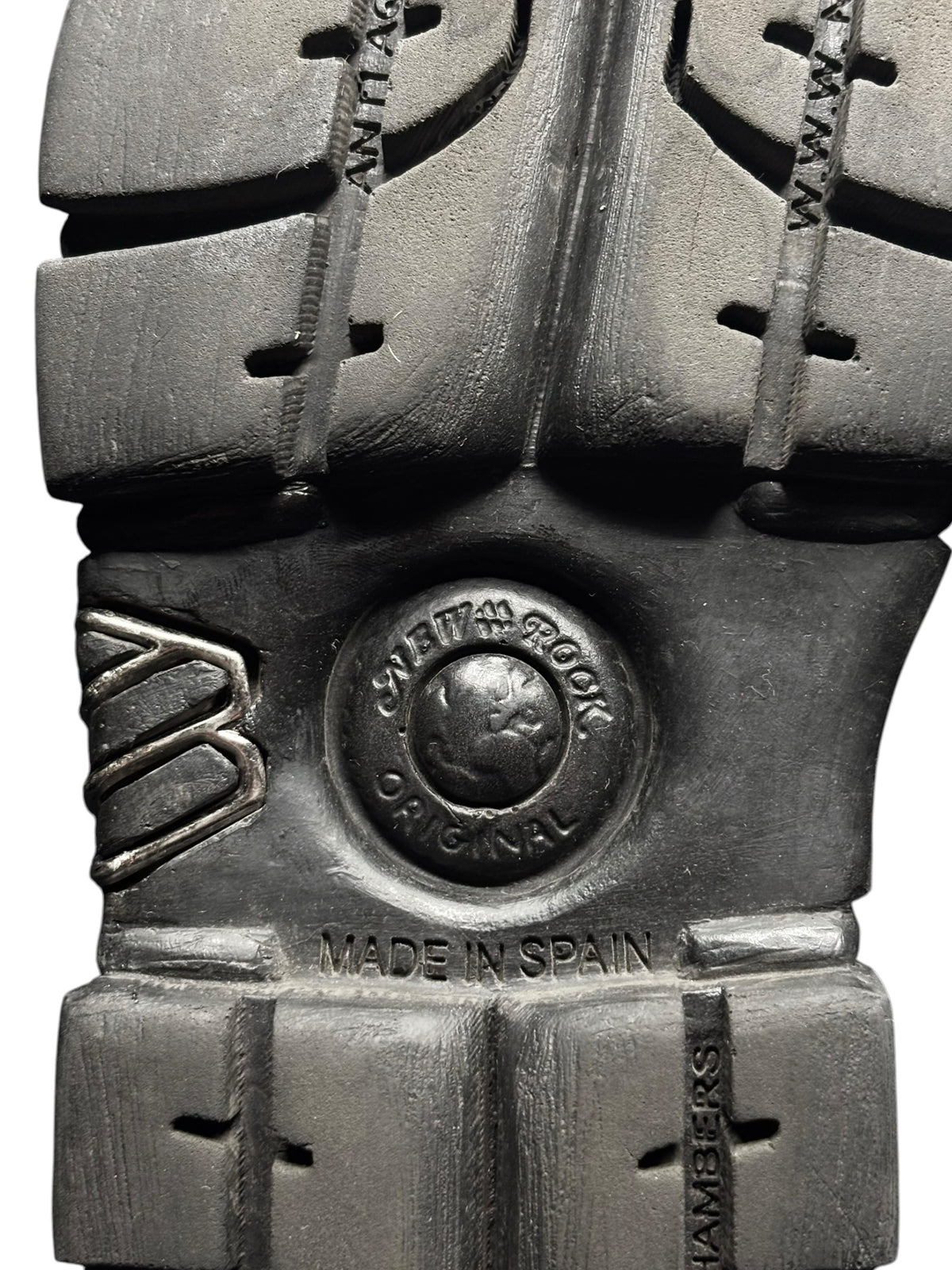 Black platform boot outsole and heel stamp showing “Made in Spain”