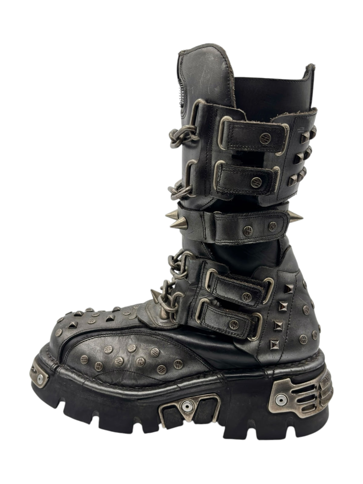Vintage studded chain boots front 3/4 view with layered straps and pointed studs
