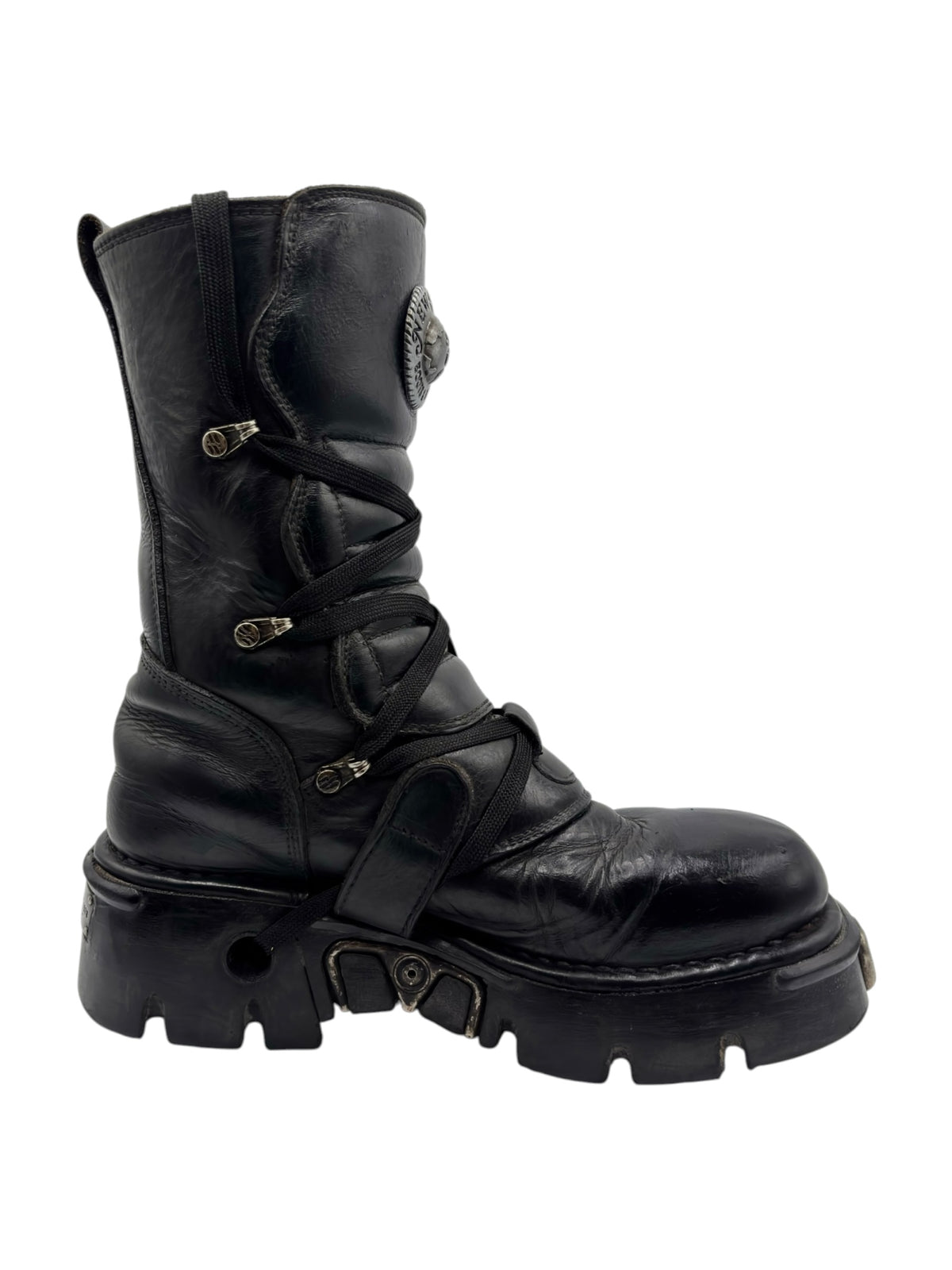 Black leather mid-calf boots with buckled straps and thick platform sole