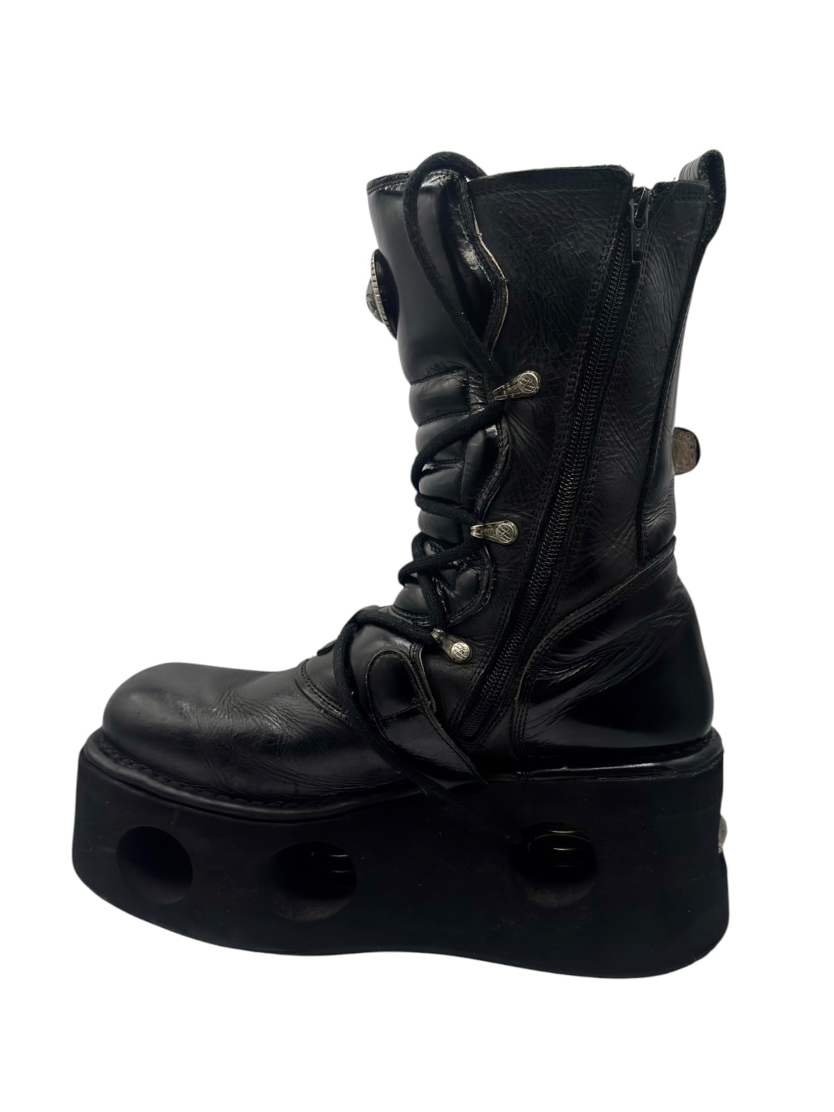 Black mid-calf platform boots with lace-up front and side buckle hardware