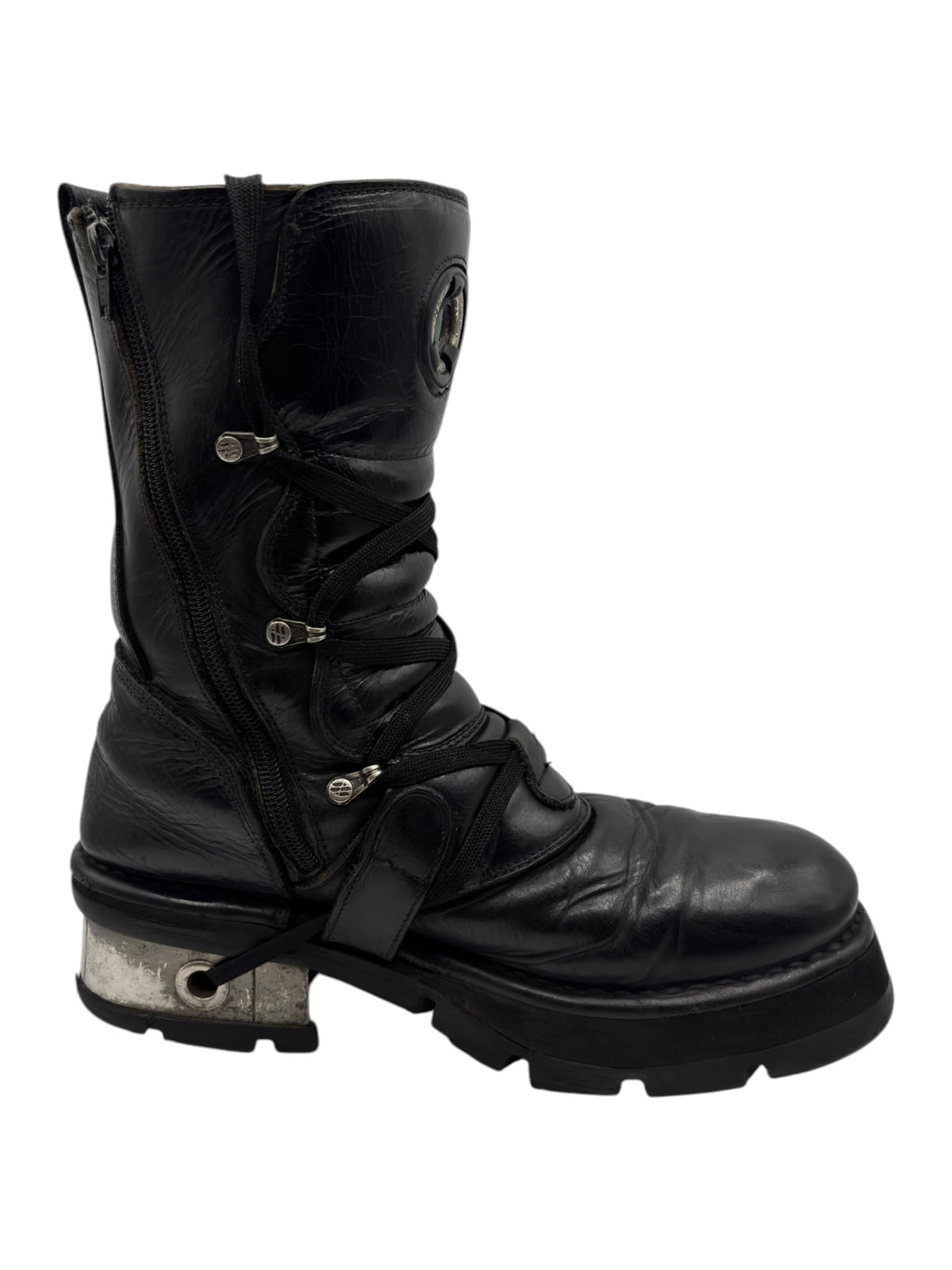 Black leather mid-calf boots with layered straps, buckles, and rugged sole
