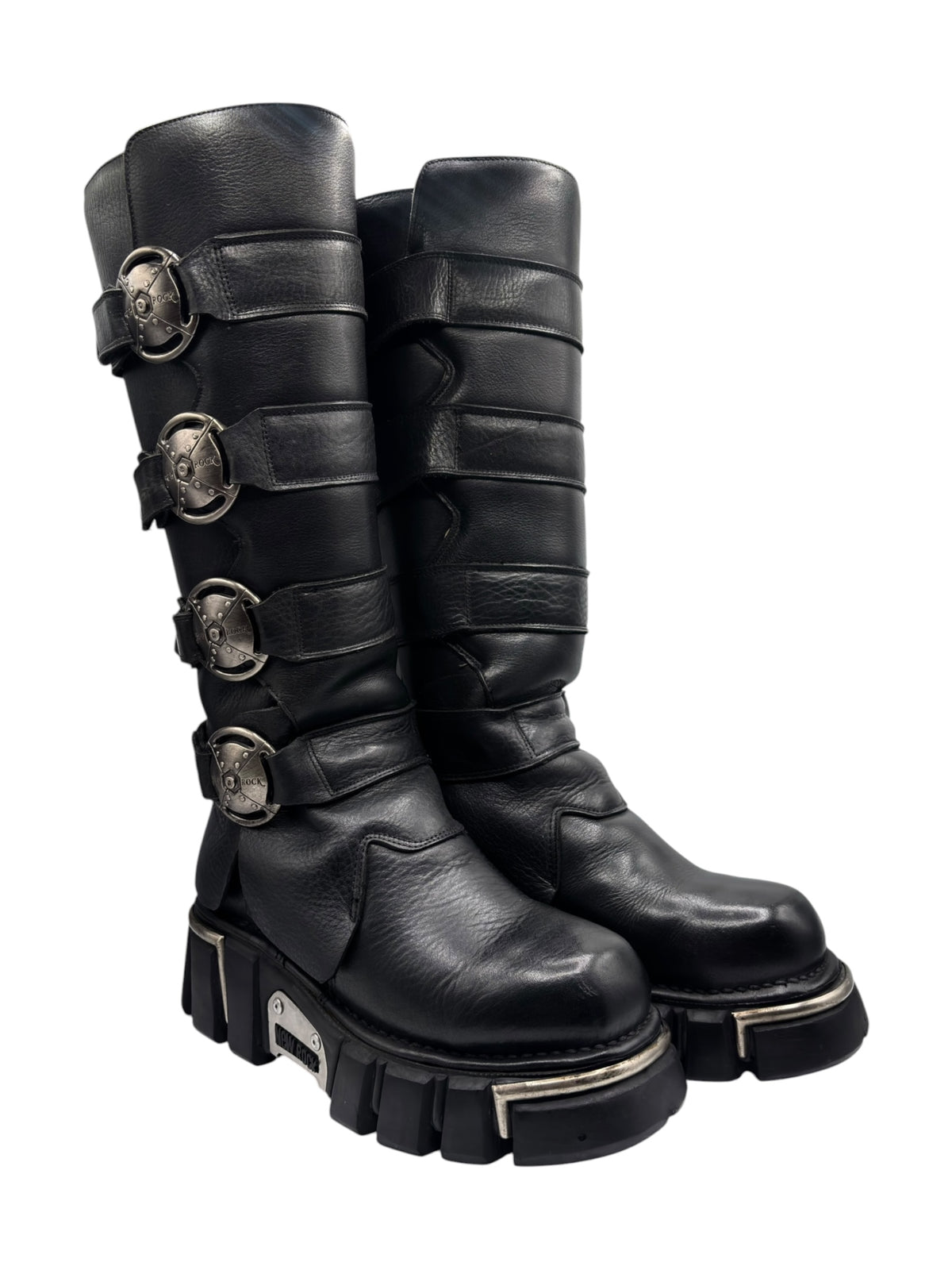Knee-high leather boots, dark black, side buckles and platform-style lug sole