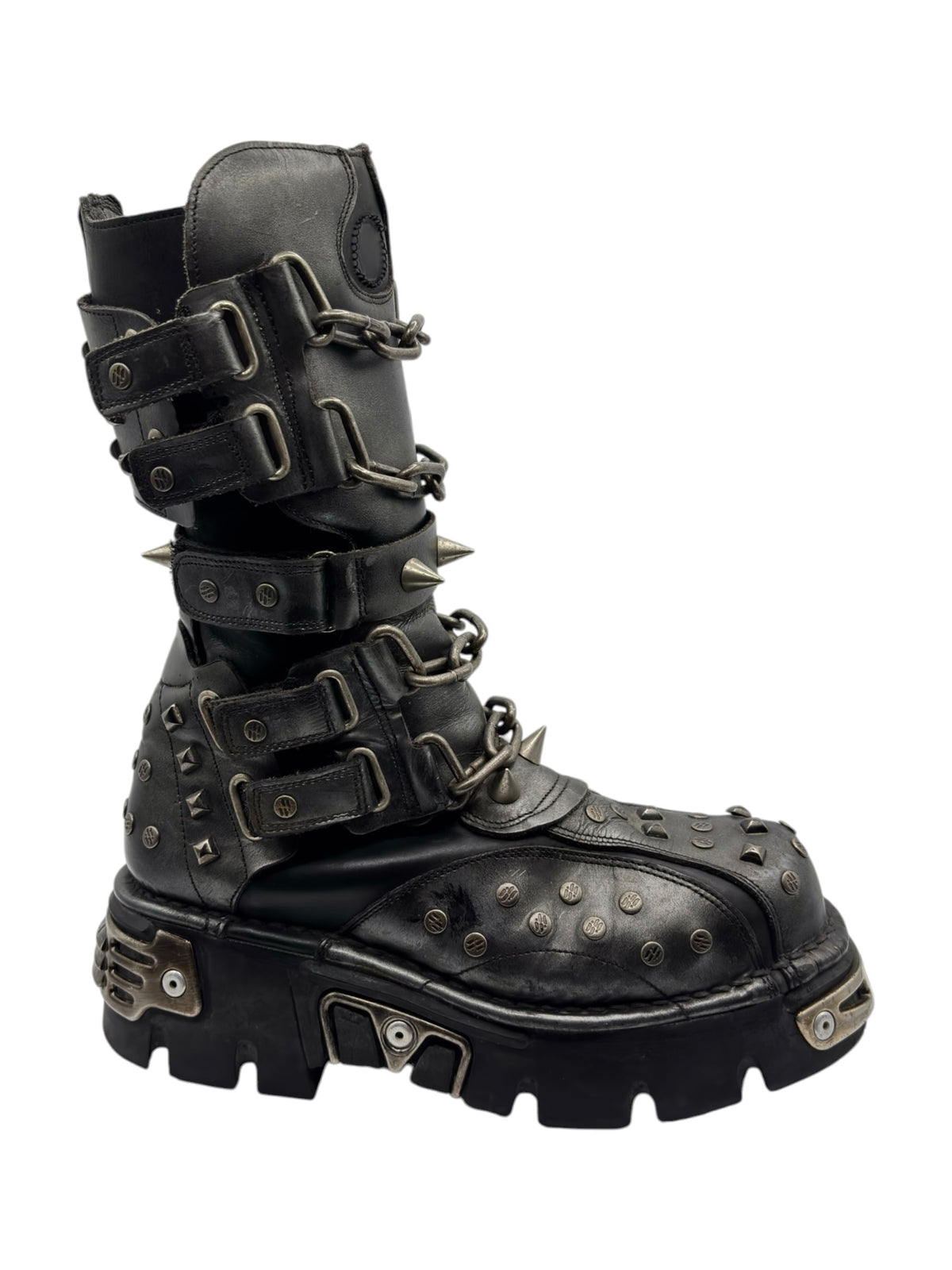 Vintage studded chain boots angled view with ankle straps and riveted toe cap
