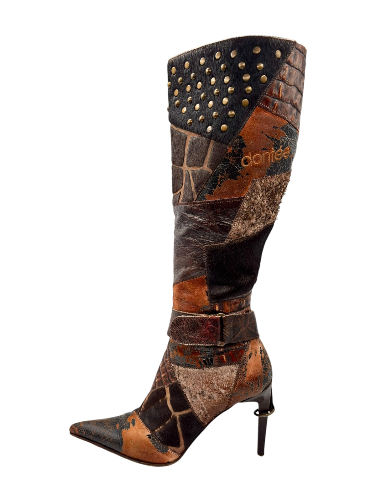 Single knee-high patchwork boot with black studded cuff, ankle straps, and stiletto heel.