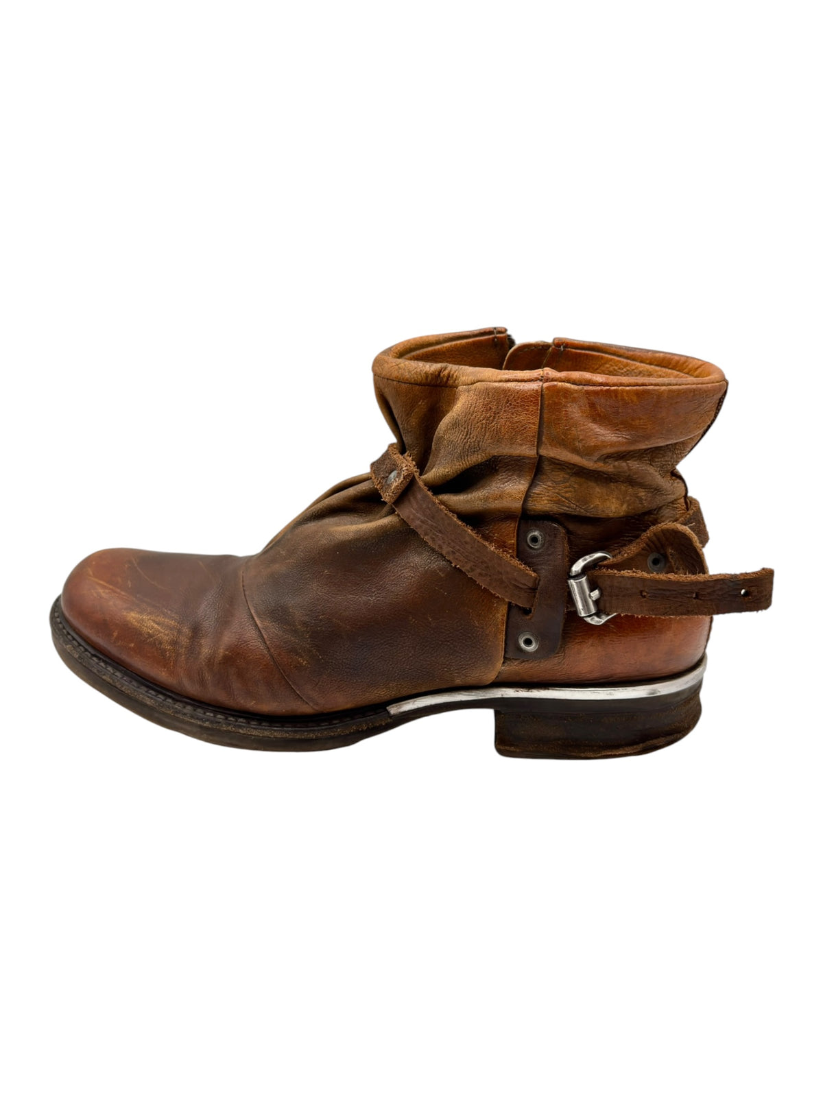 Brown leather ankle boots with side strap, metal buckle, and zipper closure