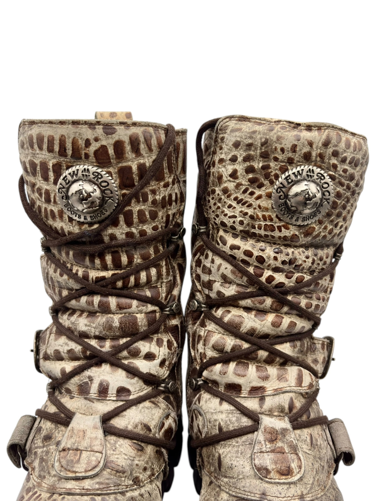 Front view of mid-calf desert-camo boots with lace ties, two buckles, and rugged sole