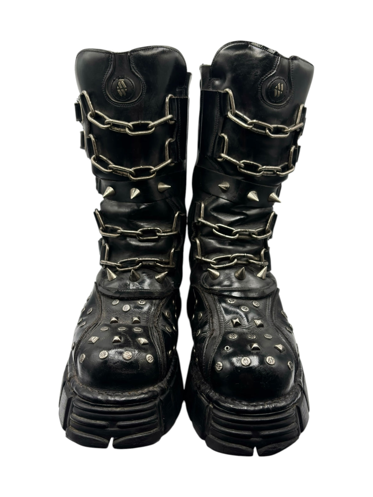 Studded chain platform boots in black, rear view with chain straps and small stud accents