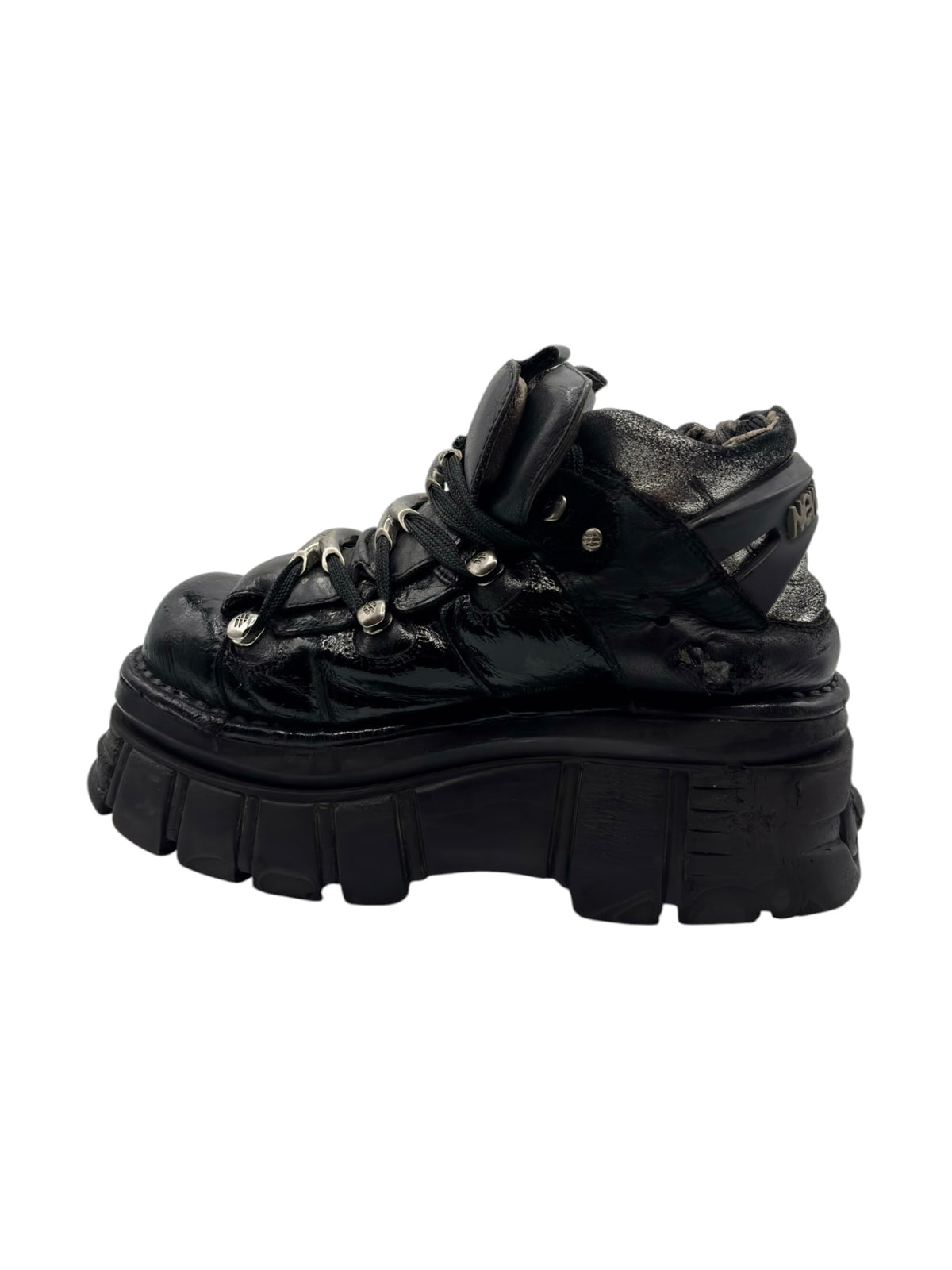Black Vintage New Rock platform boots, angled side view with metal eyelets