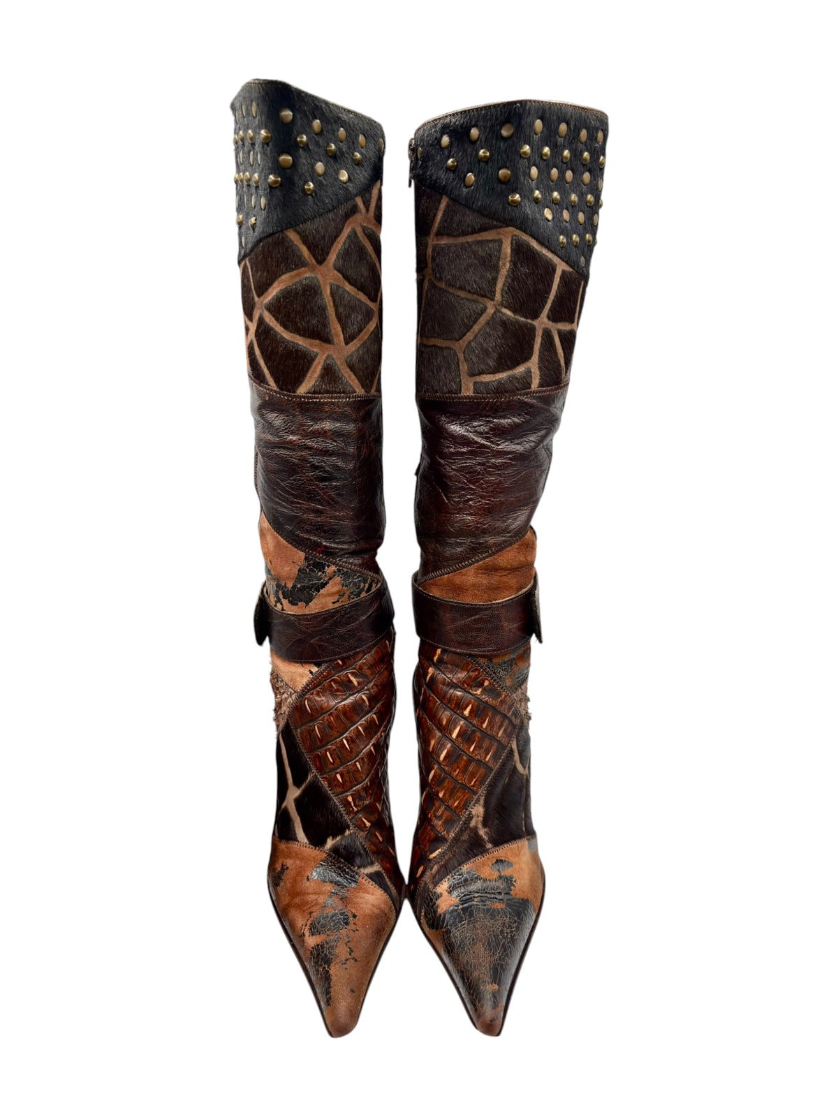Knee-high patchwork boots front view, dark shaft with gold studs and geometric stitched panels