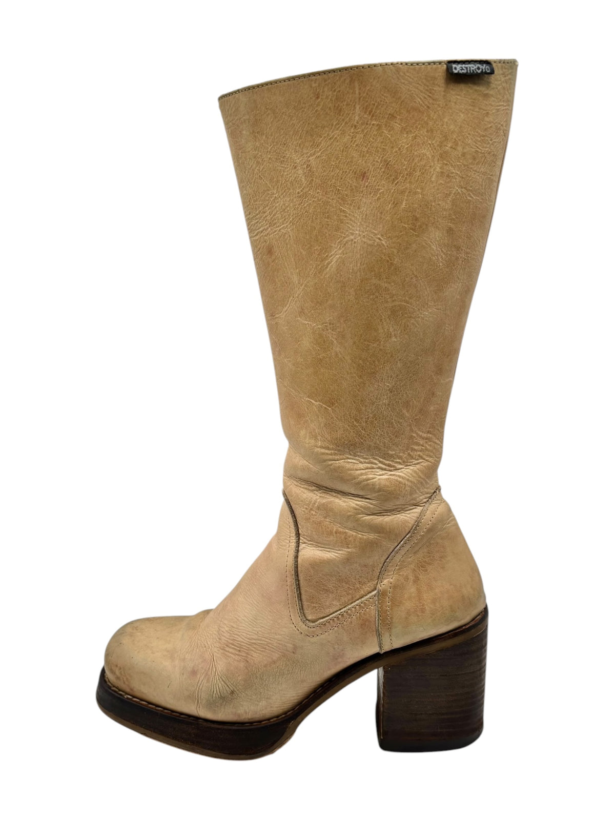 Beige knee-high leather platform boots with chunky block heel and rounded toe.