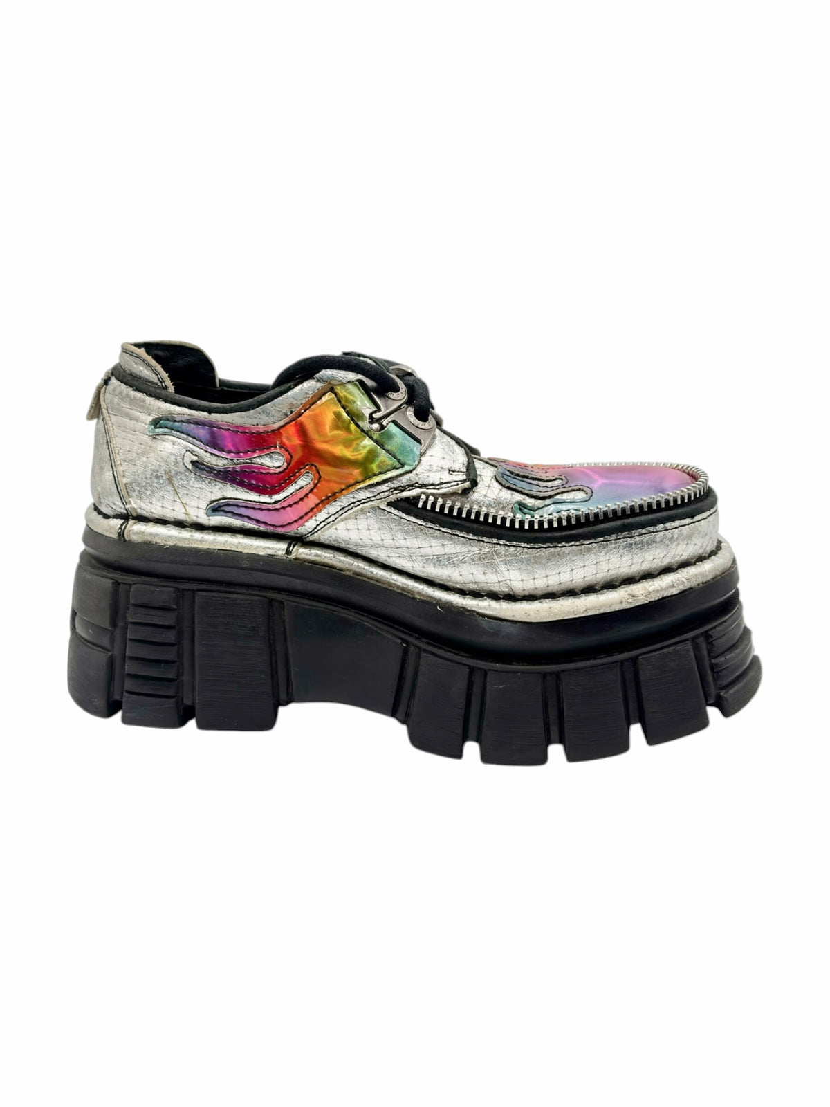 White platform ankle boots with multicolor flame trim and black zip accent
