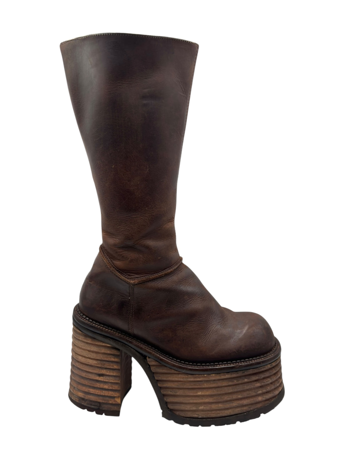 Dark brown knee-high platform boots with rounded toe and stacked block heel