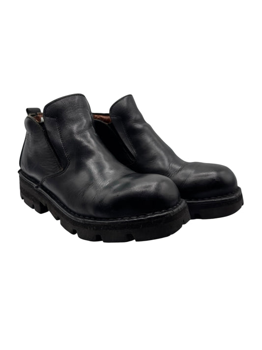 Black leather ankle boots with side gore and chunky rubber sole