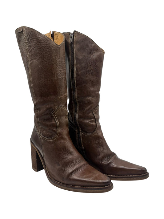 Brown leather mid-calf cowboy boots with pointy toes and stacked block heel.