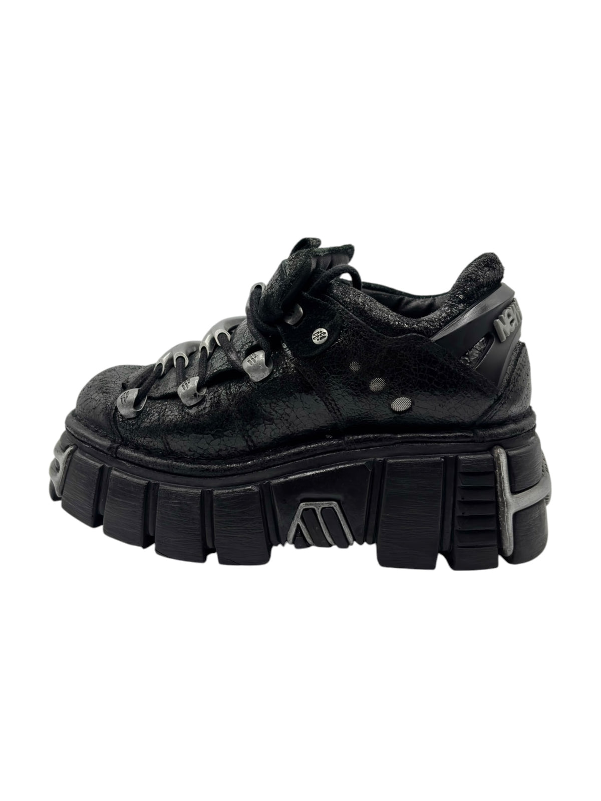 Black lace-up platform boots with chunky stacked sole and textured upper