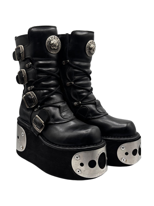 Black lace-up platform boots with buckles and silver studded sole plates