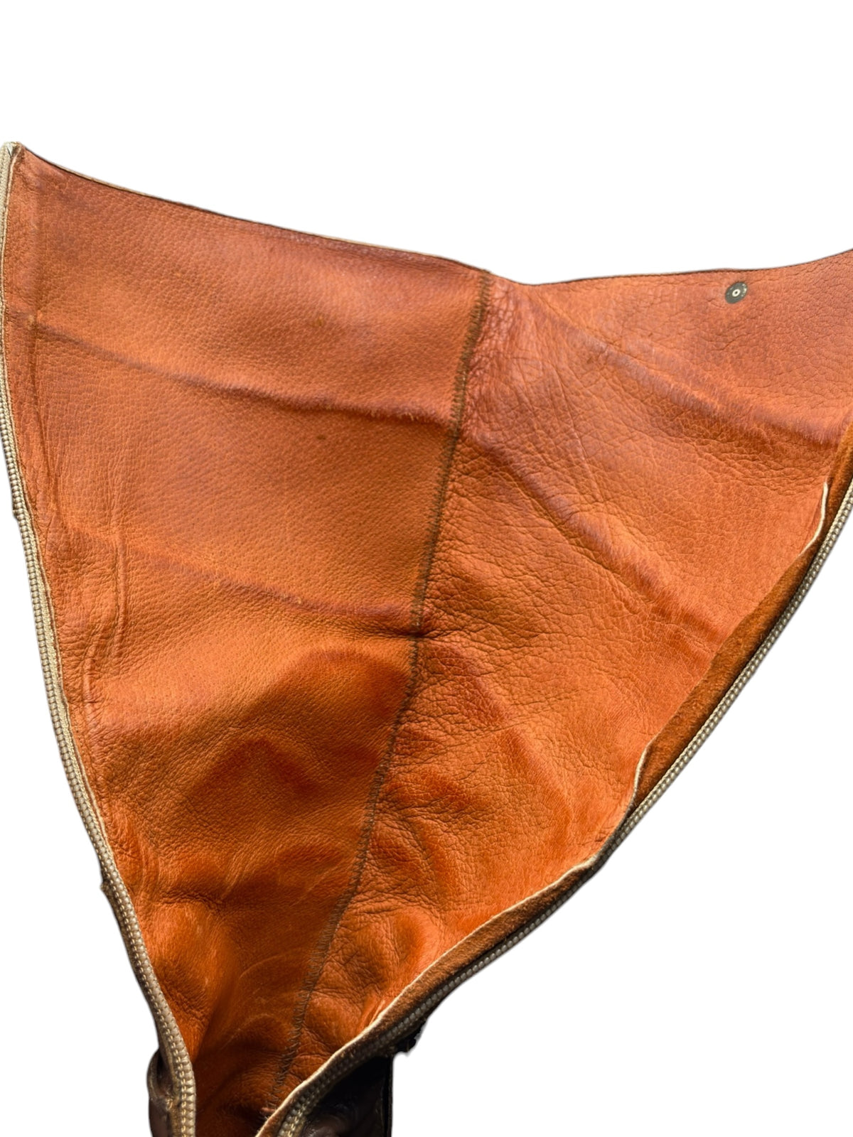Knee-high leather boot upper interior view with stitched seams and lining detail