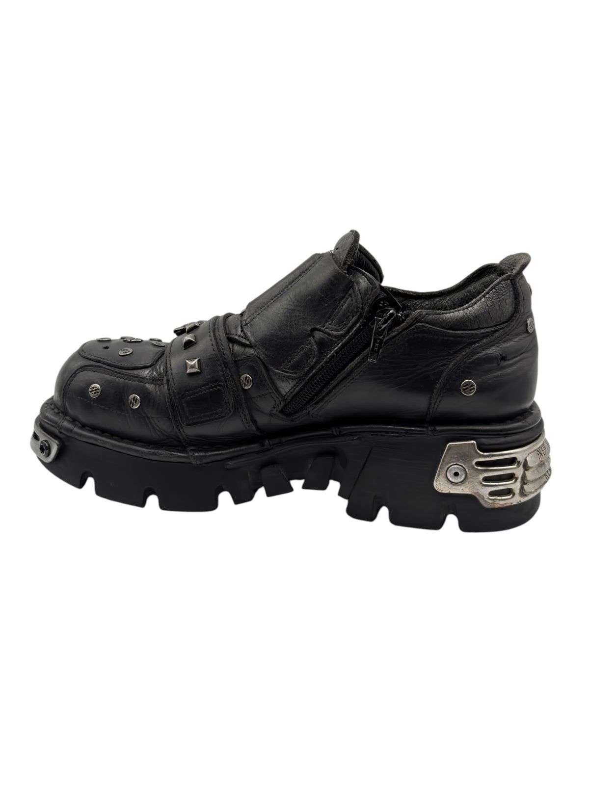 Black New Rock platform boots with thick sole, strap details, and metal side plate