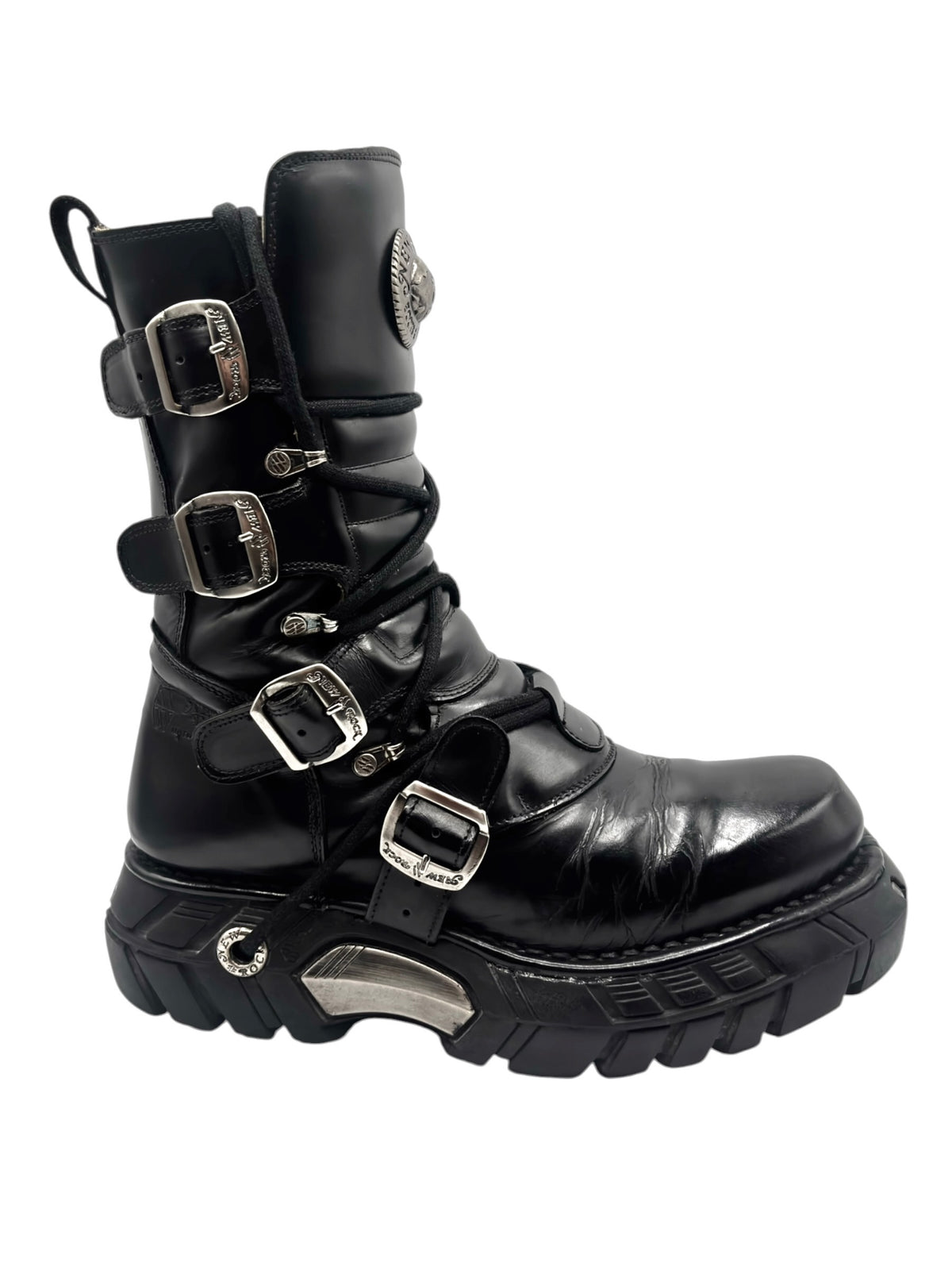 Black leather lace-up platform boots with several front straps and buckles, 3/4 view.