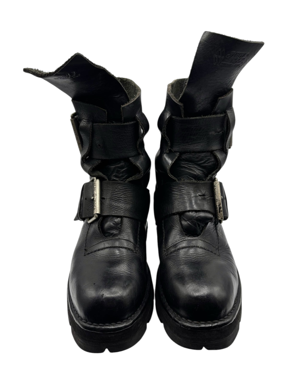 Black leather buckle boots with chunky sole and ankle straps