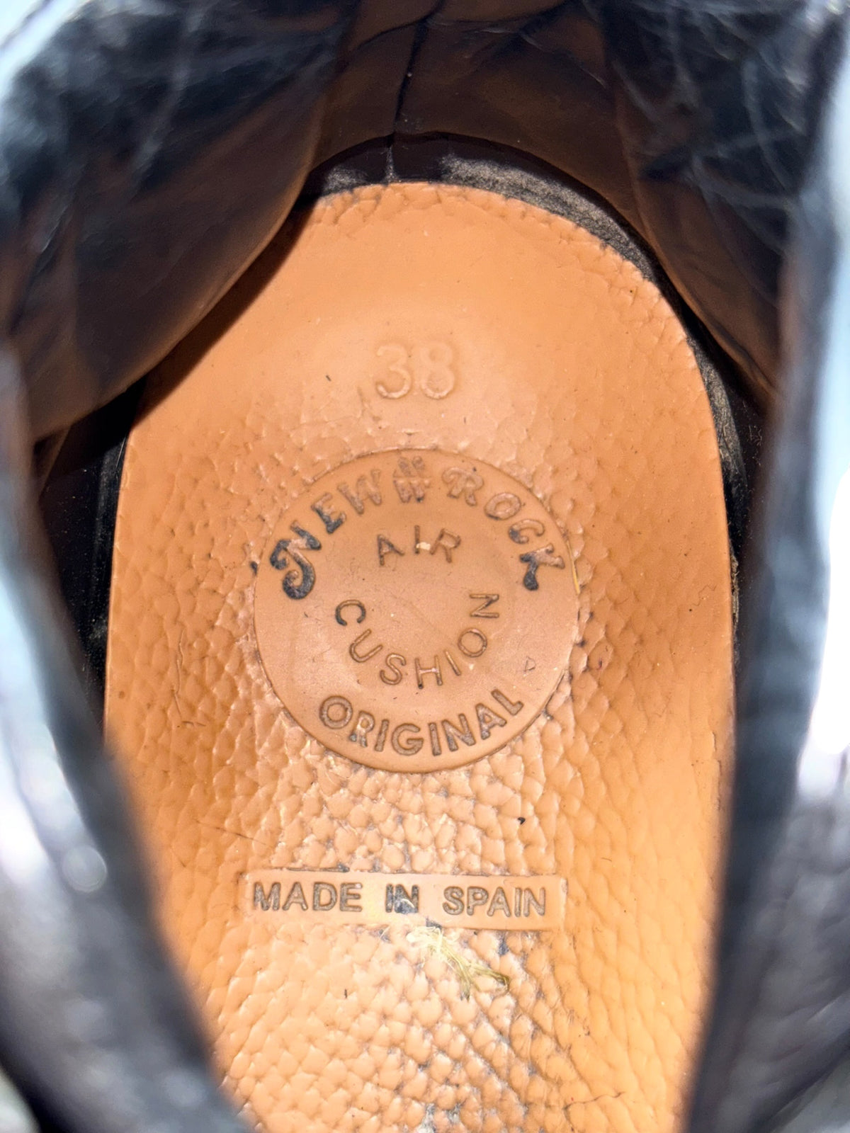 Platform boot insole close-up with size 38 and made in Spain branding.