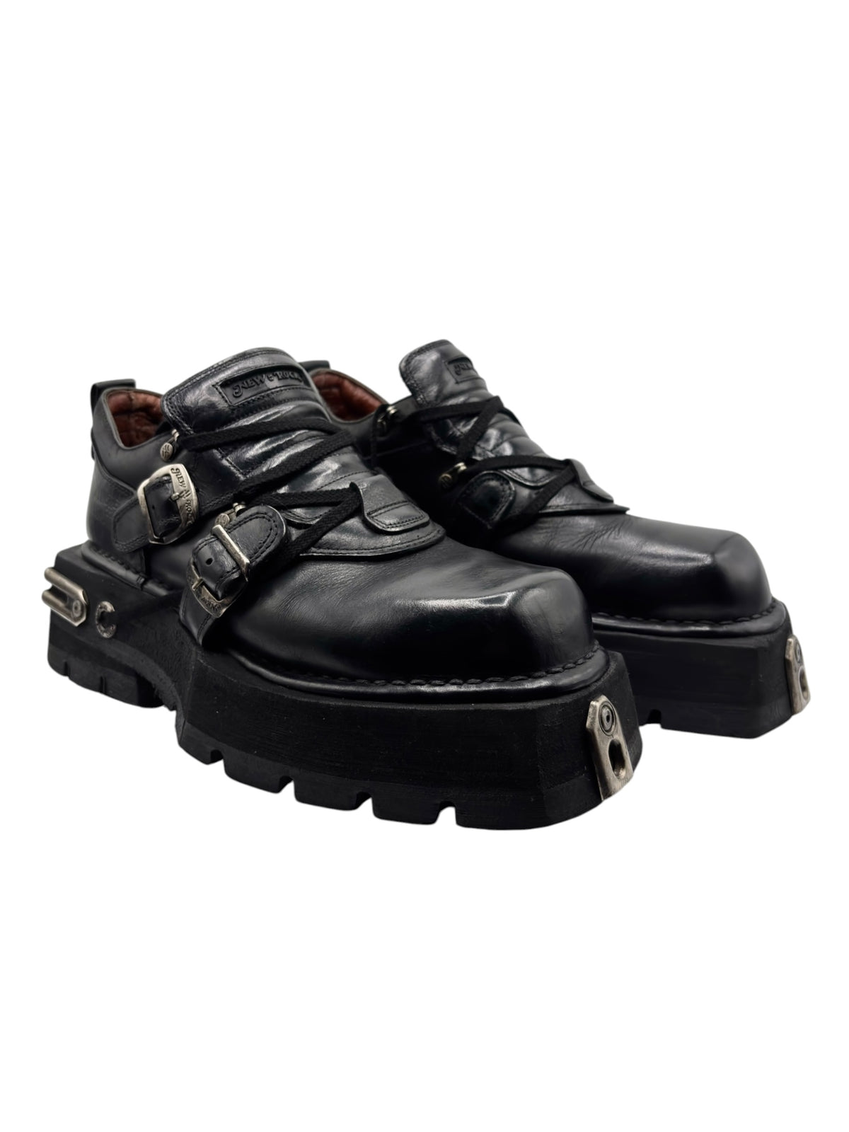 Vintage New Rock pluto platform boots: angled side view with side buckle hardware