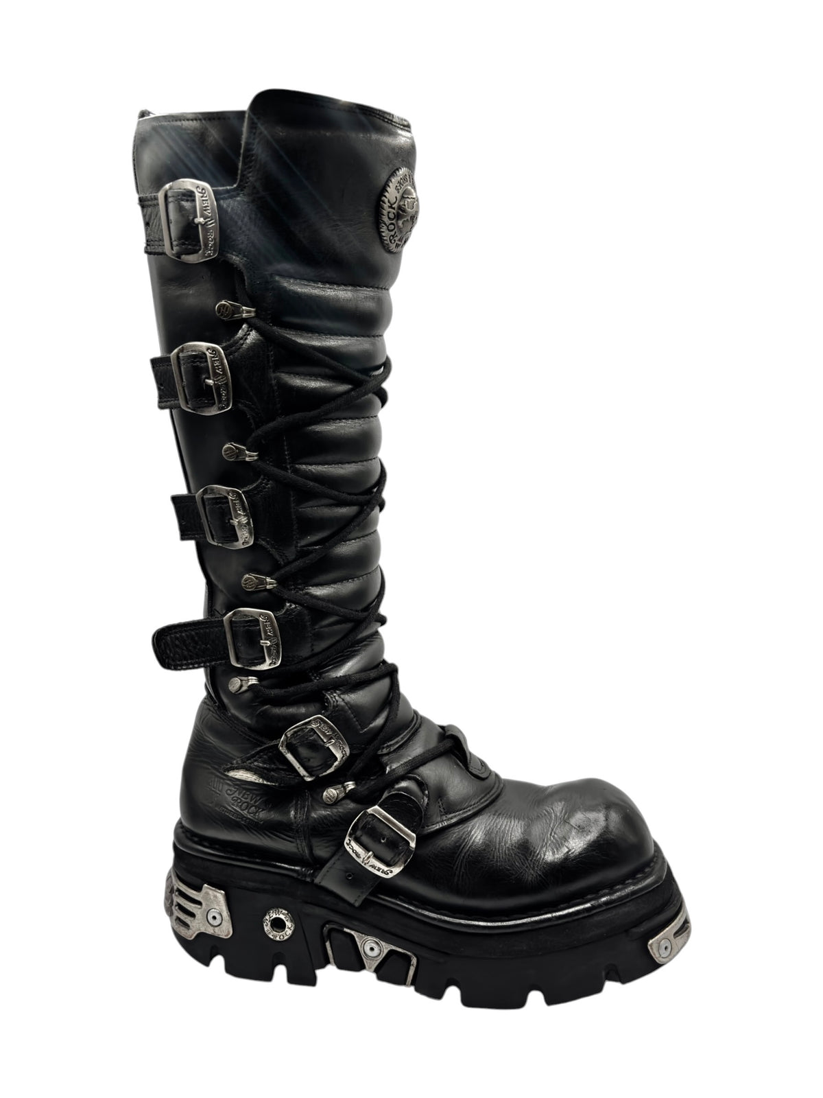 Knee-high black reactor boots with lace-up front, buckles, and thick platform sole