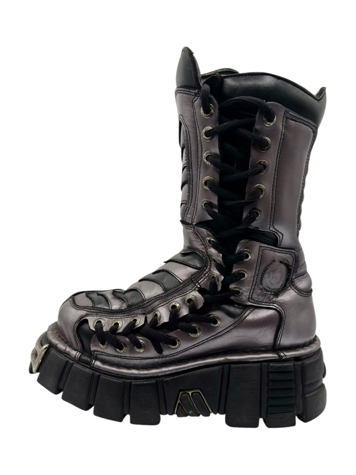 Black lace-up platform boots with high shaft, padded panels, and chunky rocker sole
