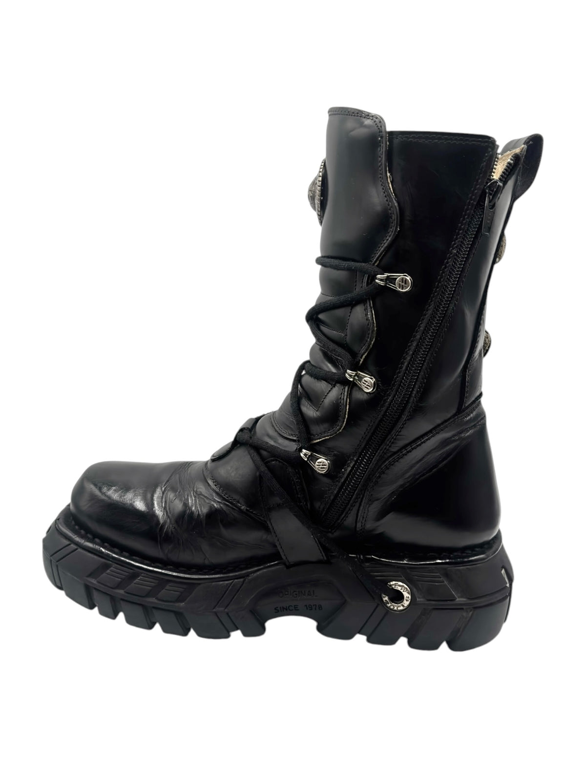 Black leather platform boots with zipper side and lace-up front, angled side view.