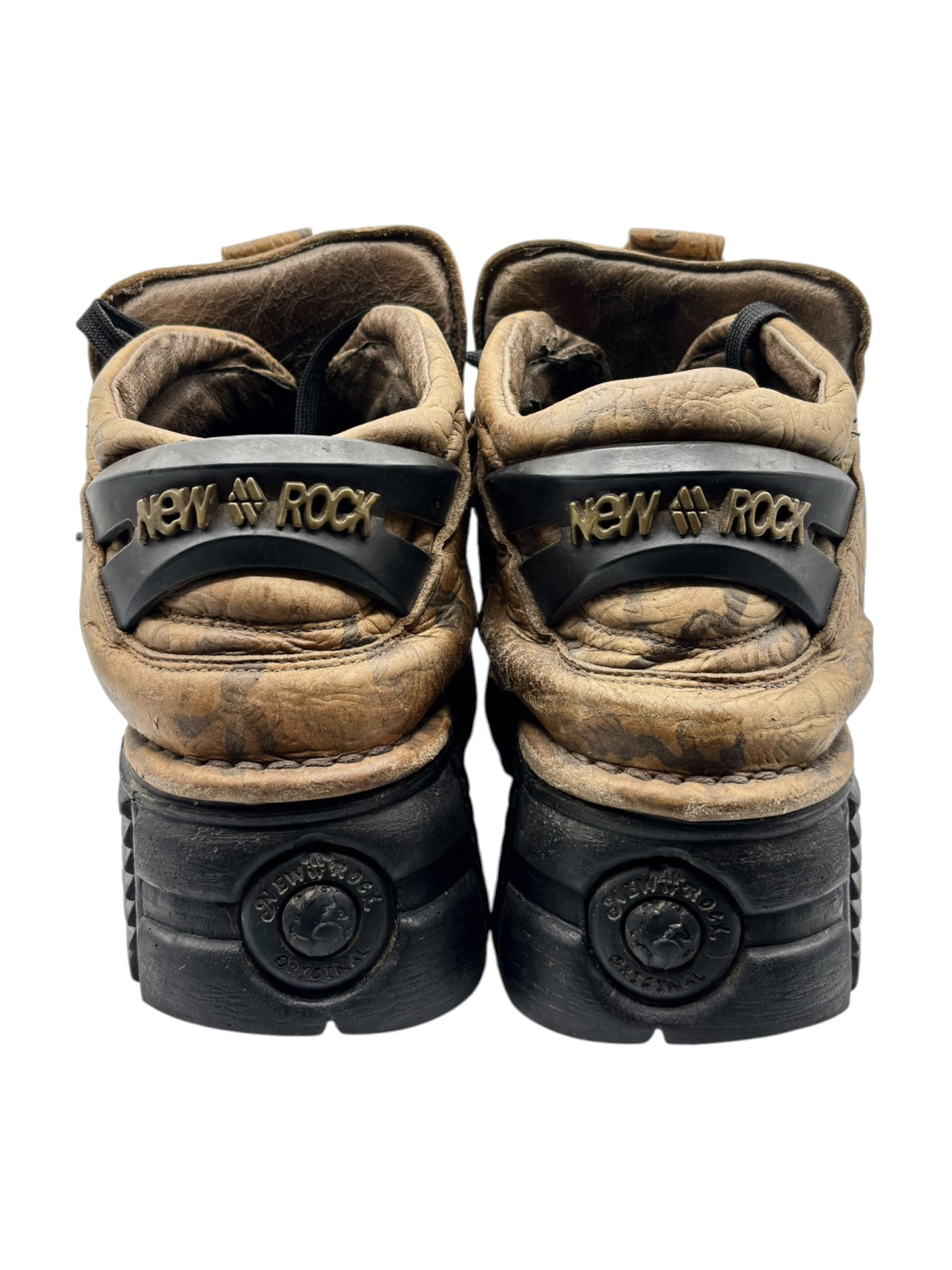New Rock platform boots showing dark liner and footbed logo, tan-brown camo upper