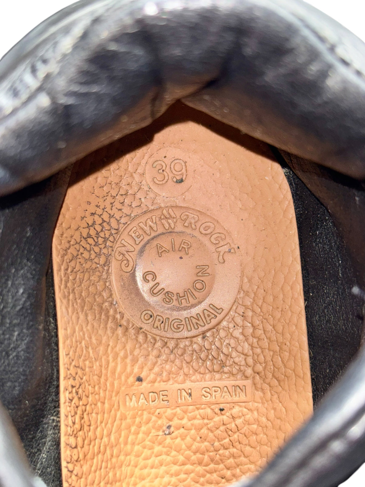 Leather boot insole with “Made in Spain” stamp and size 39 marking.