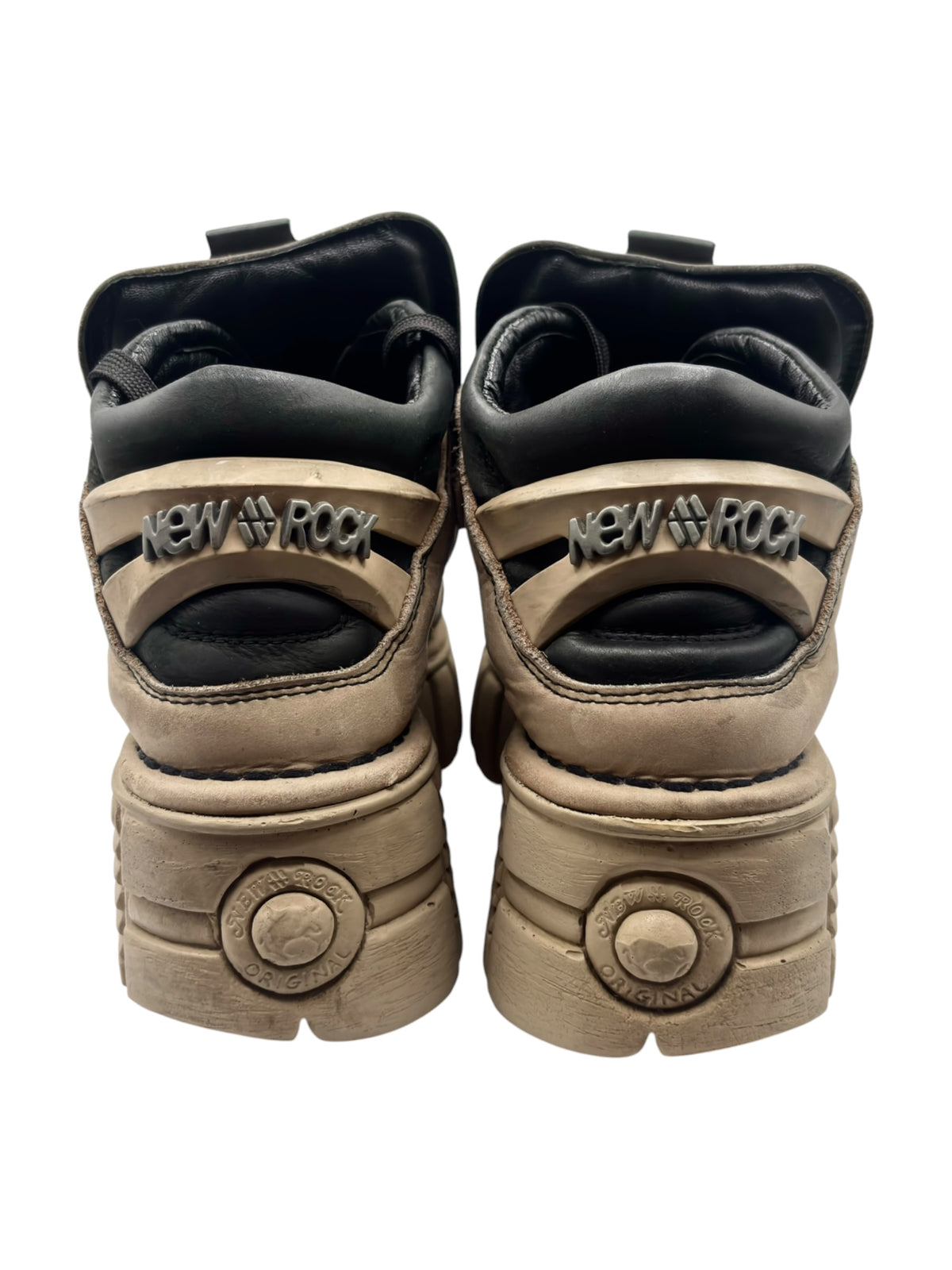 Black and beige platform boot heels with NEW ROCK logo on the back