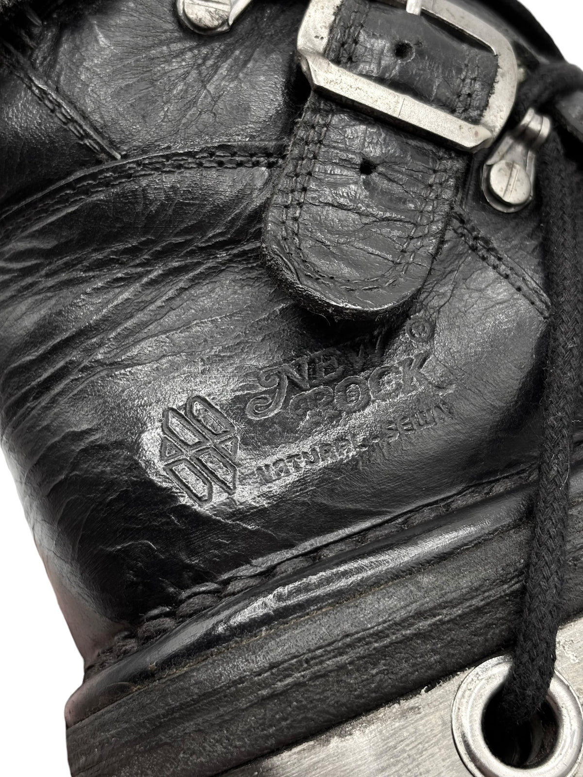 New Rock leather boot upper with embossed logo and metal buckle strap