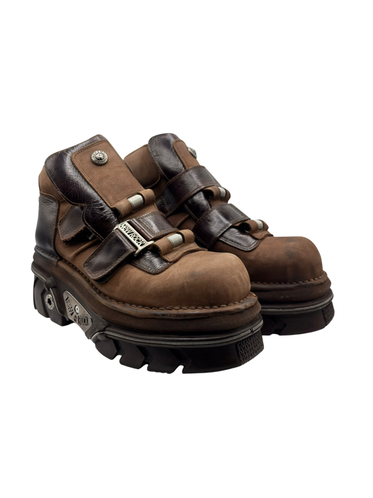 Brown platform buckle boots with dual side straps and textured outsole