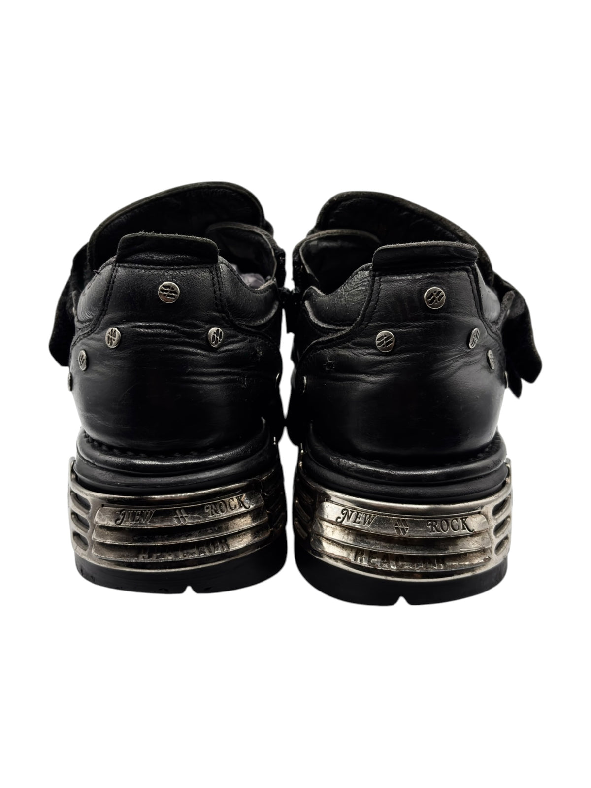 Back view of black New Rock platform boots with stacked-sole detailing