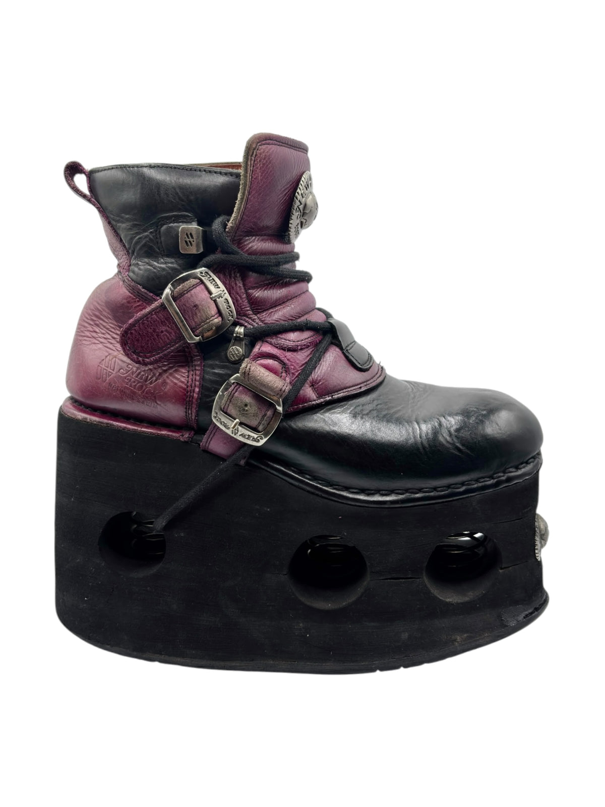 Burgundy and black ankle platform boots with cross-laced straps and buckles